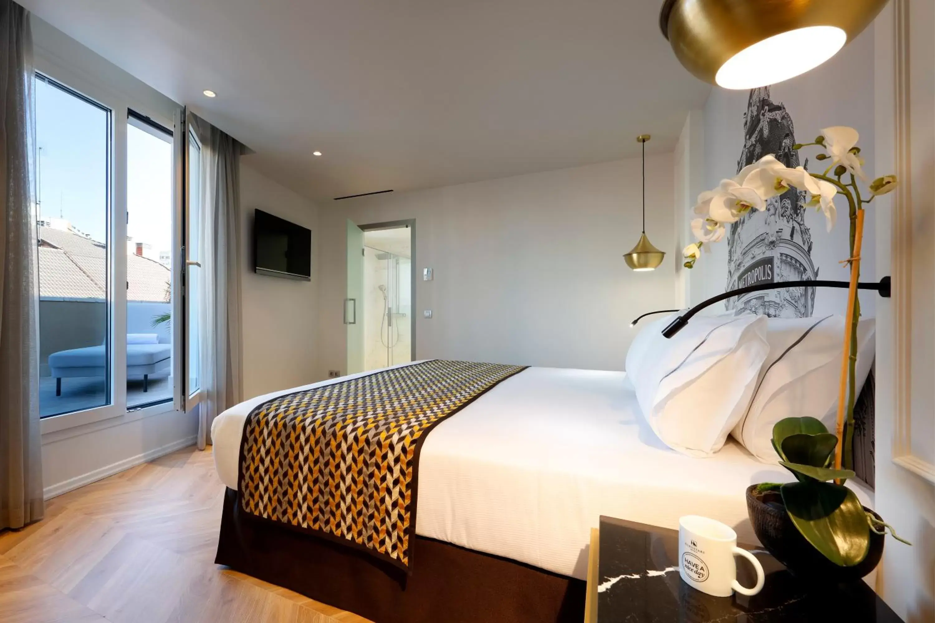Photo of the whole room, Bed in Eurostars Madrid Gran Vía