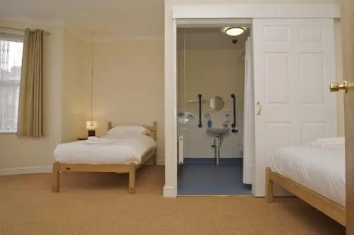 Bedroom in All Seasons Lodge Hotel