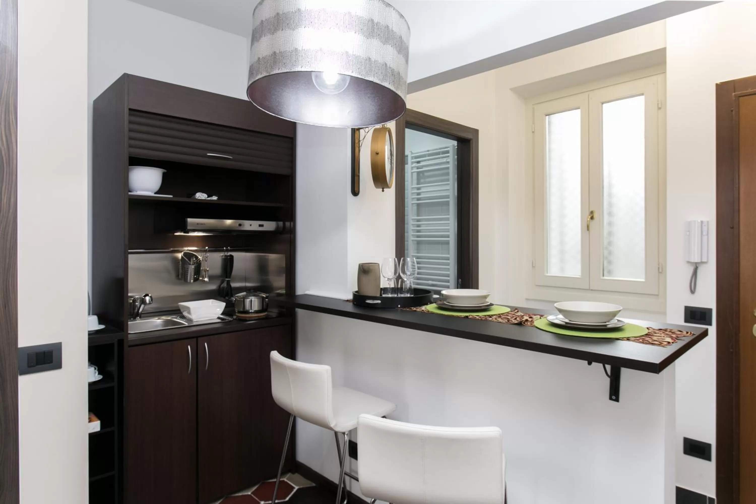 Kitchen or kitchenette in Aparthotel Dei Mercanti