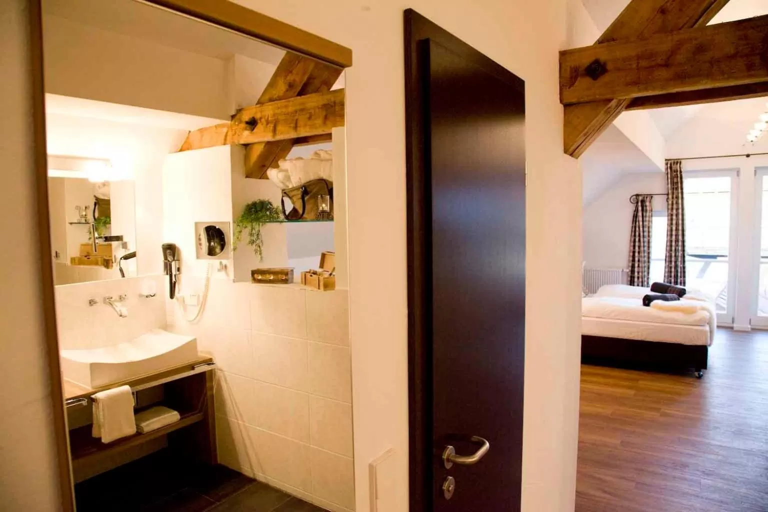 Photo of the whole room, Bed in Alpin Lifestyle Hotel Löwen & Strauss