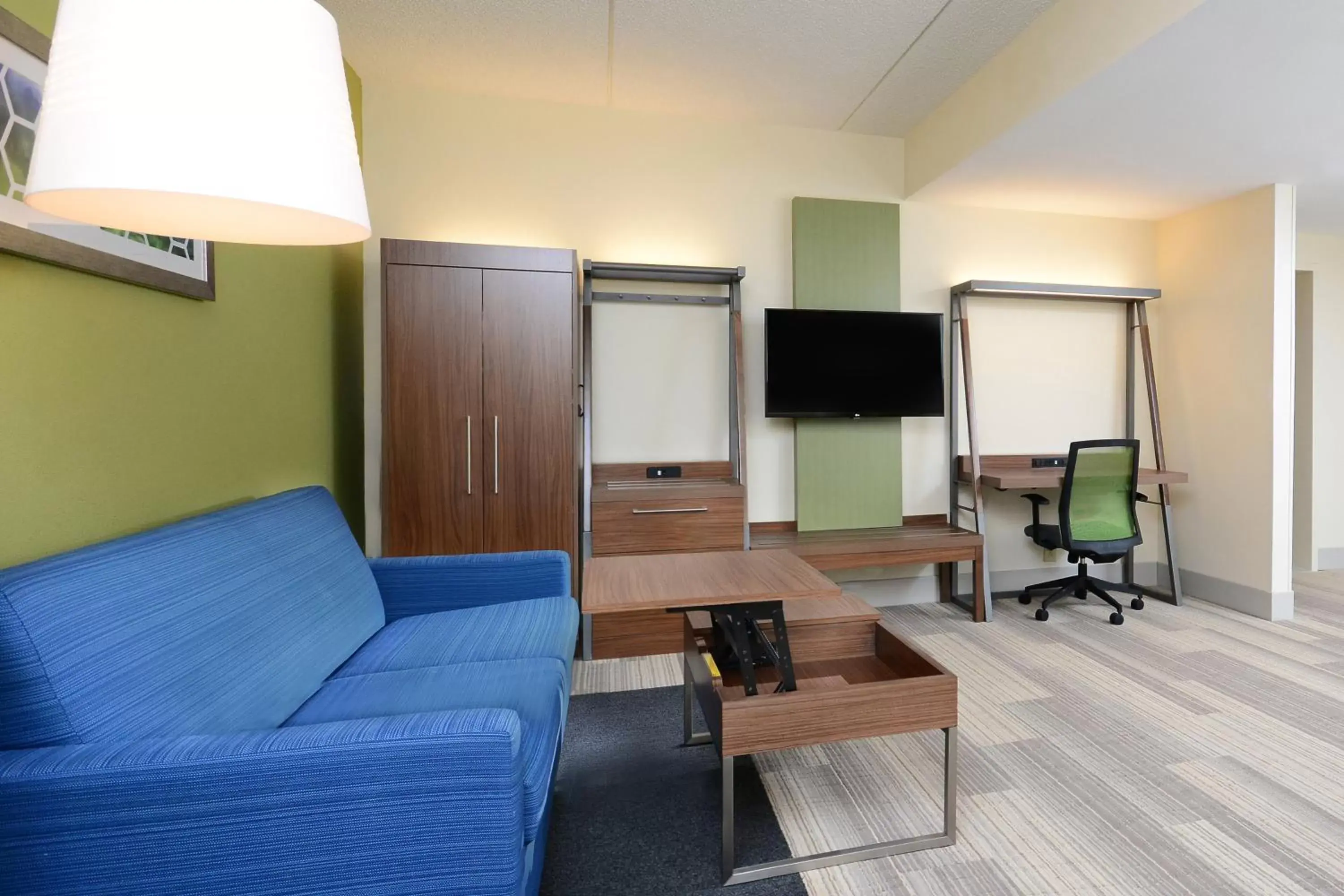 Photo of the whole room, Seating Area in Holiday Inn Express & Suites Raleigh Durham Airport at RTP, an IHG Hotel