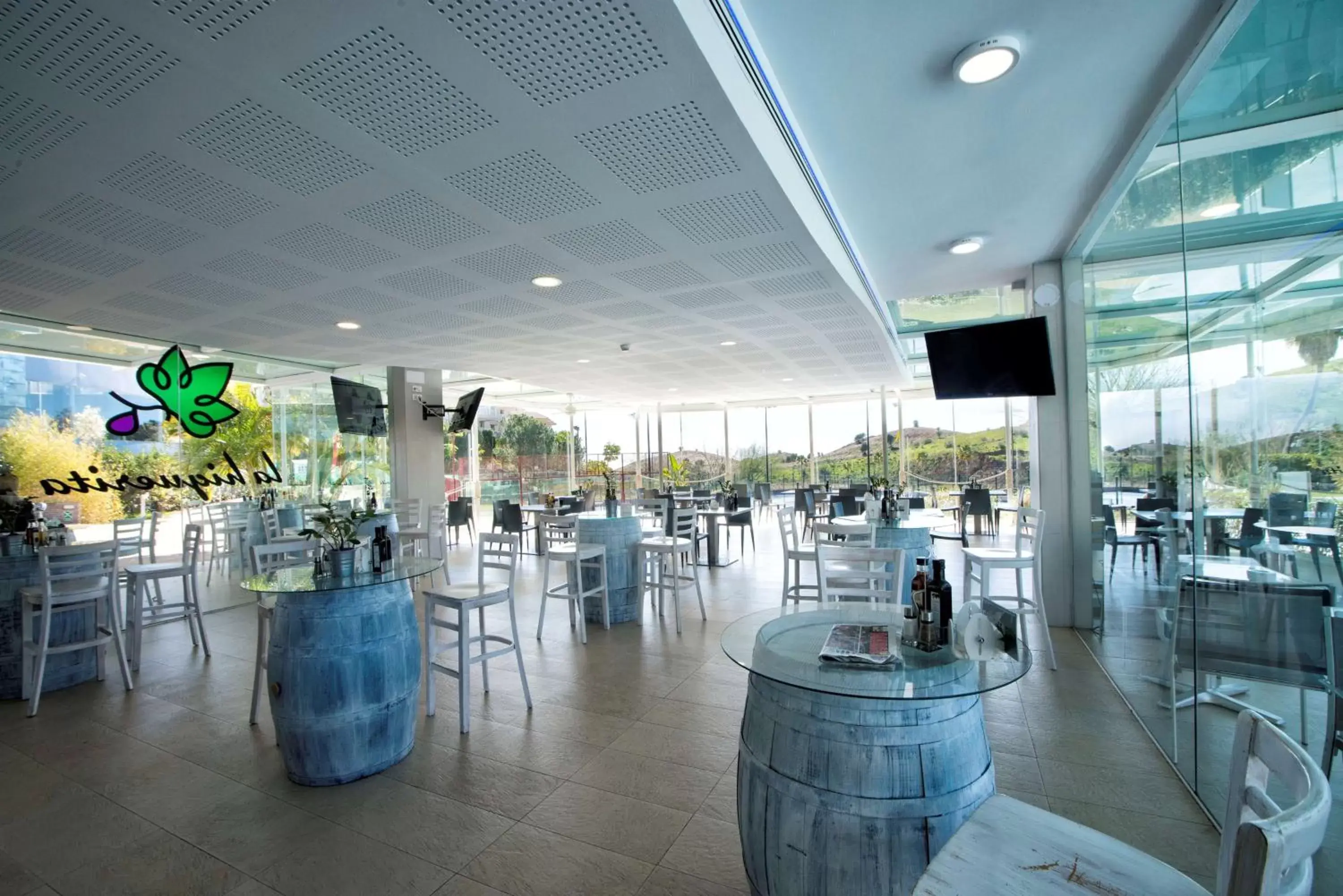 Dining area in Higuerón Hotel Curio Collection by Hilton