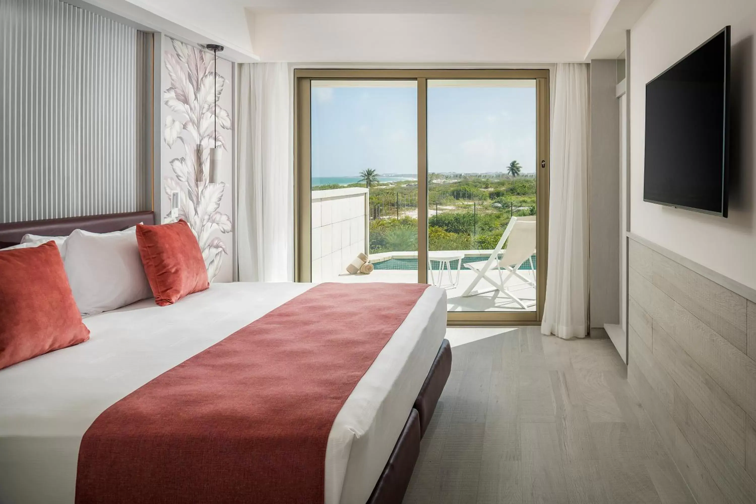Bedroom, Bed in Catalonia Grand Costa Mujeres All Suites & Spa - All Inclusive