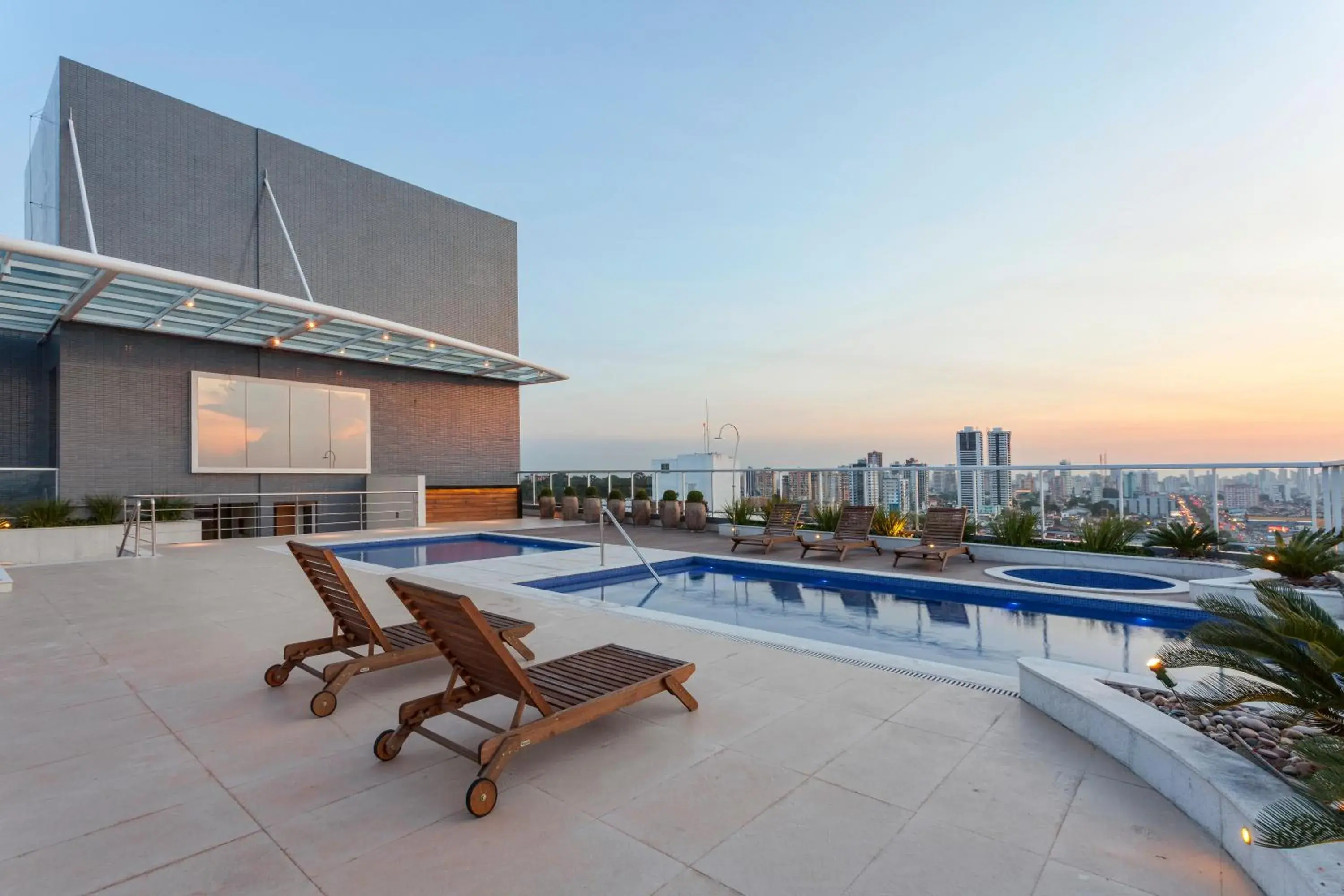 Balcony/Terrace, Swimming Pool in Ibis Styles Belém Hangar