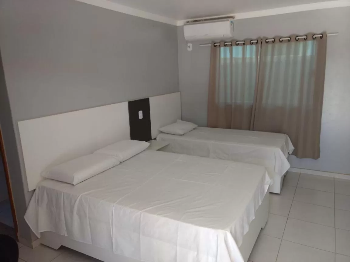 Bed in Hotel Serra do Rio