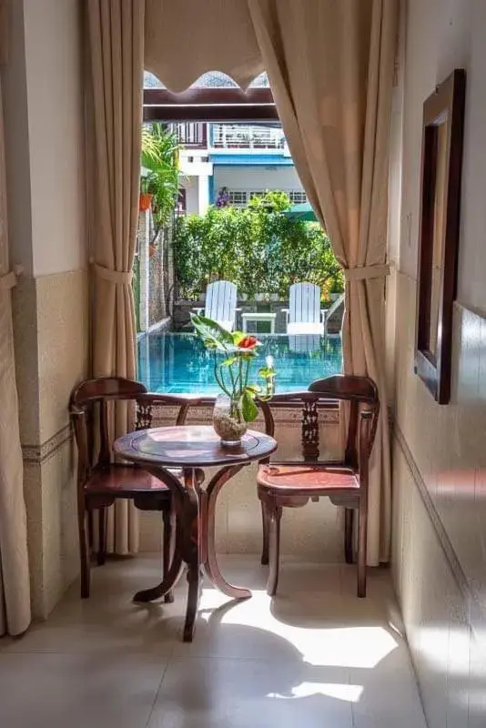 Seating area, Pool View in Hoi An Ngo Homestay