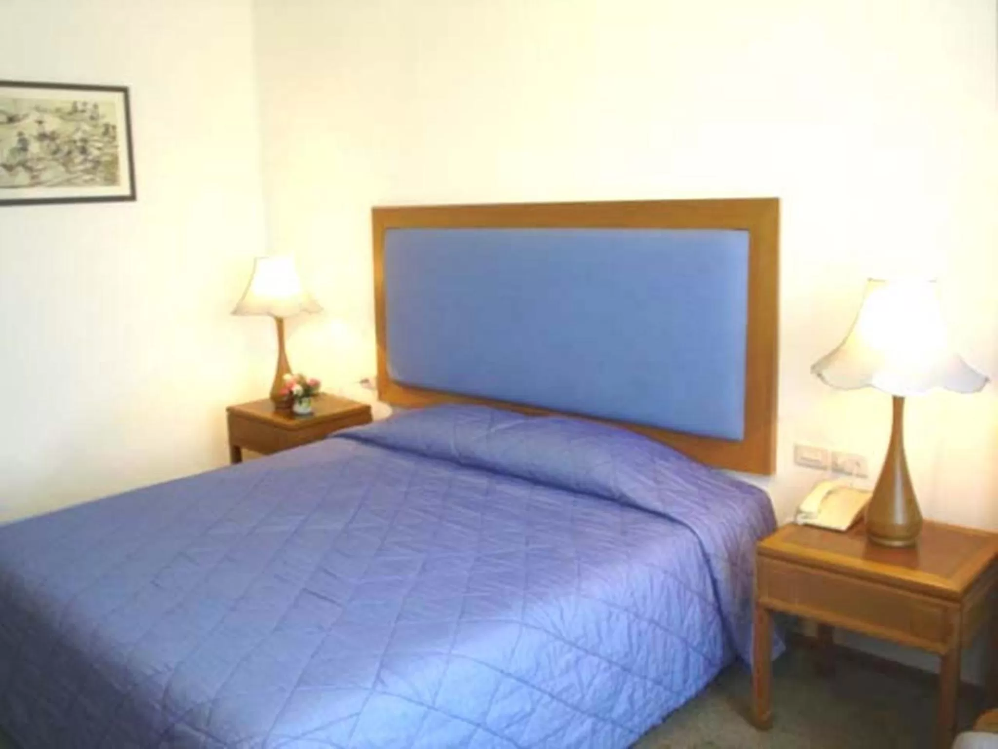 Bed in Chiang Mai Phucome Hotel