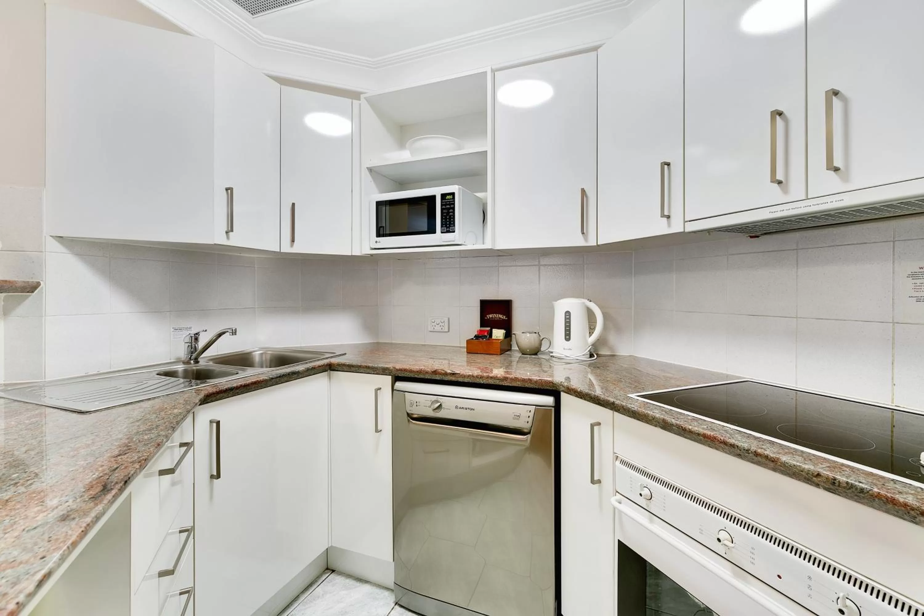 Kitchen or kitchenette in Manor Apartment Hotel