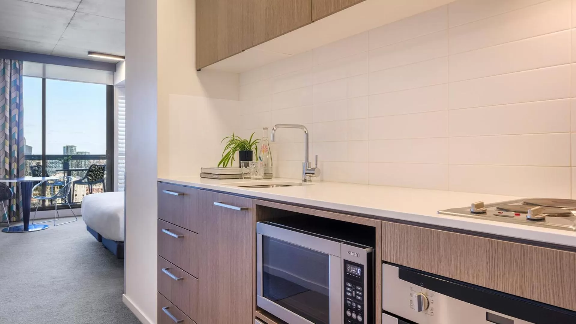 Kitchen or kitchenette in Oaks Melbourne on William Suites