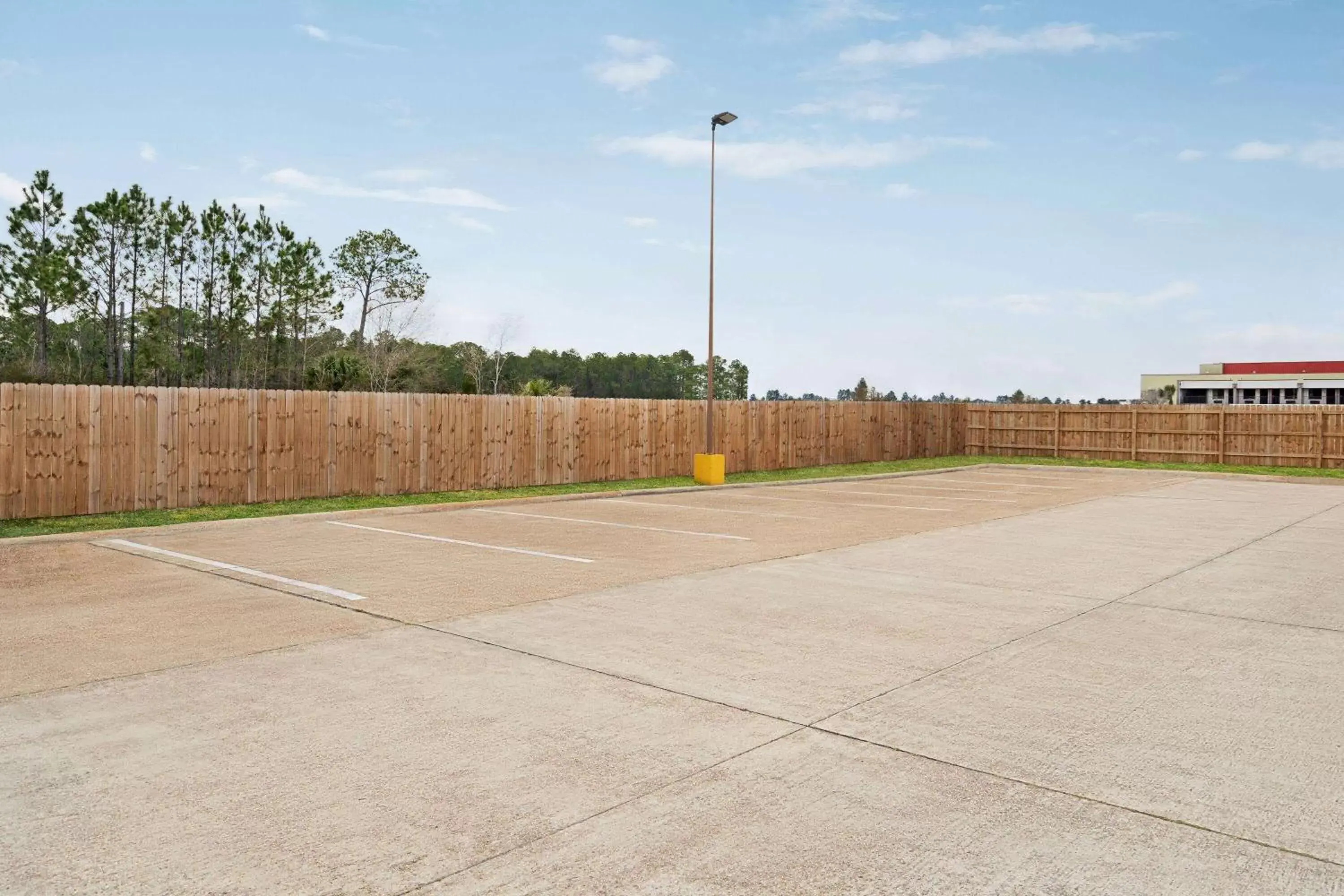 Property building in Super 8 by Wyndham Gulfport Airport NW Near Biloxi Property building in Super 8 by Wyndham Gulfport Airport NW Near Biloxi