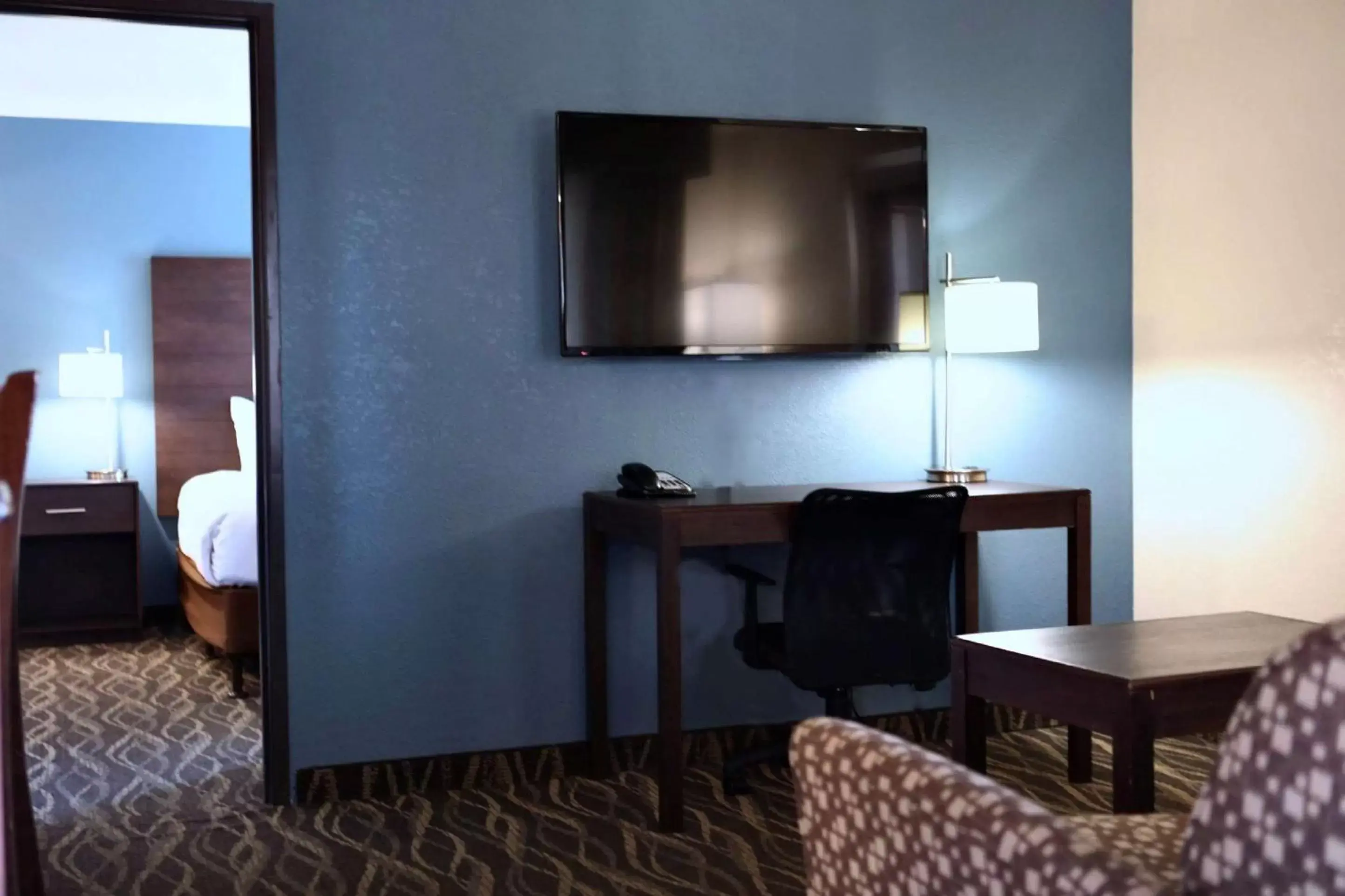 Photo of the whole room, TV/Entertainment Center in Best Western InnSuites Tucson Foothills Hotel & Suites