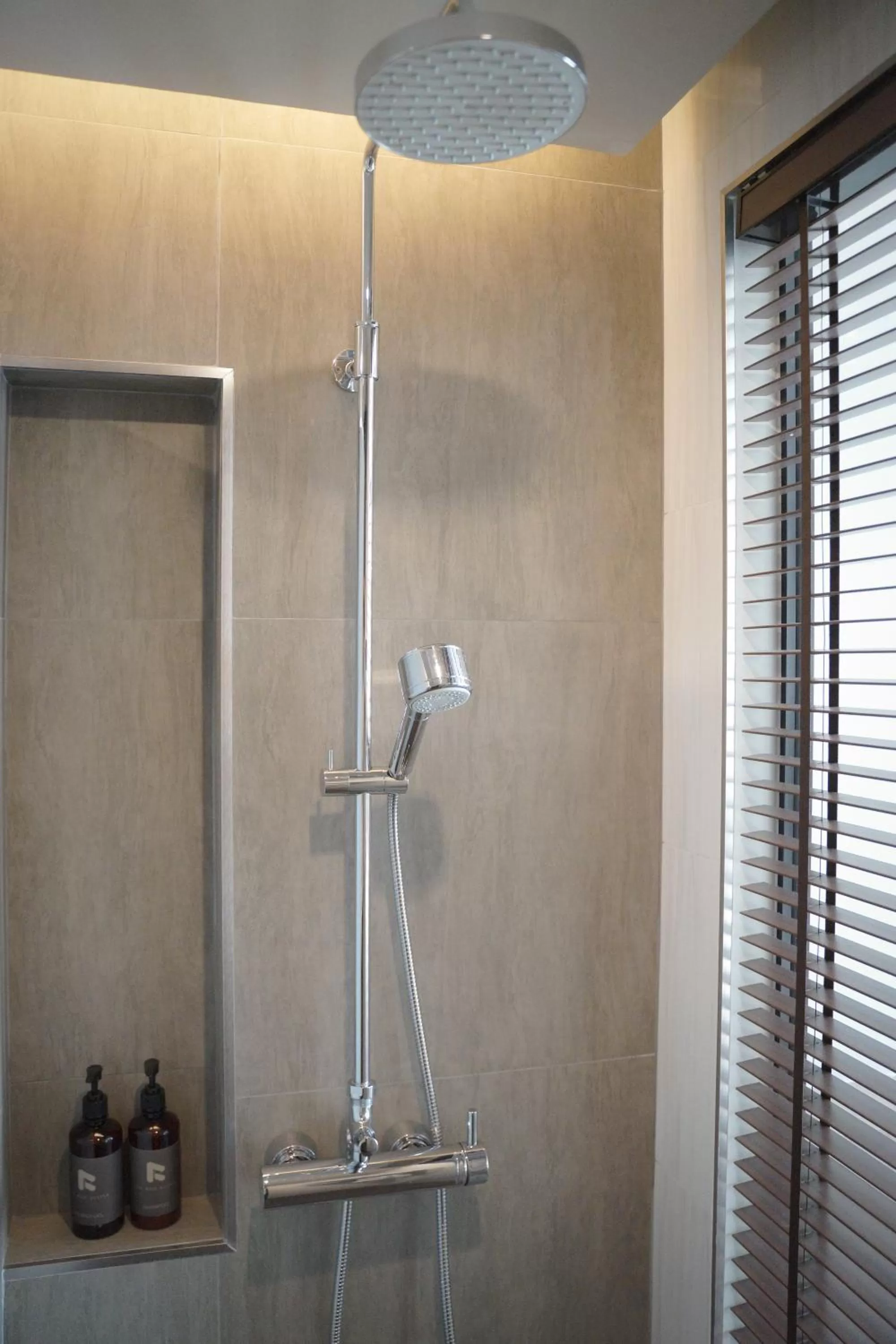 Bathroom in The Rise Suites Hotel, Chiang Mai - SHA Extra Plus