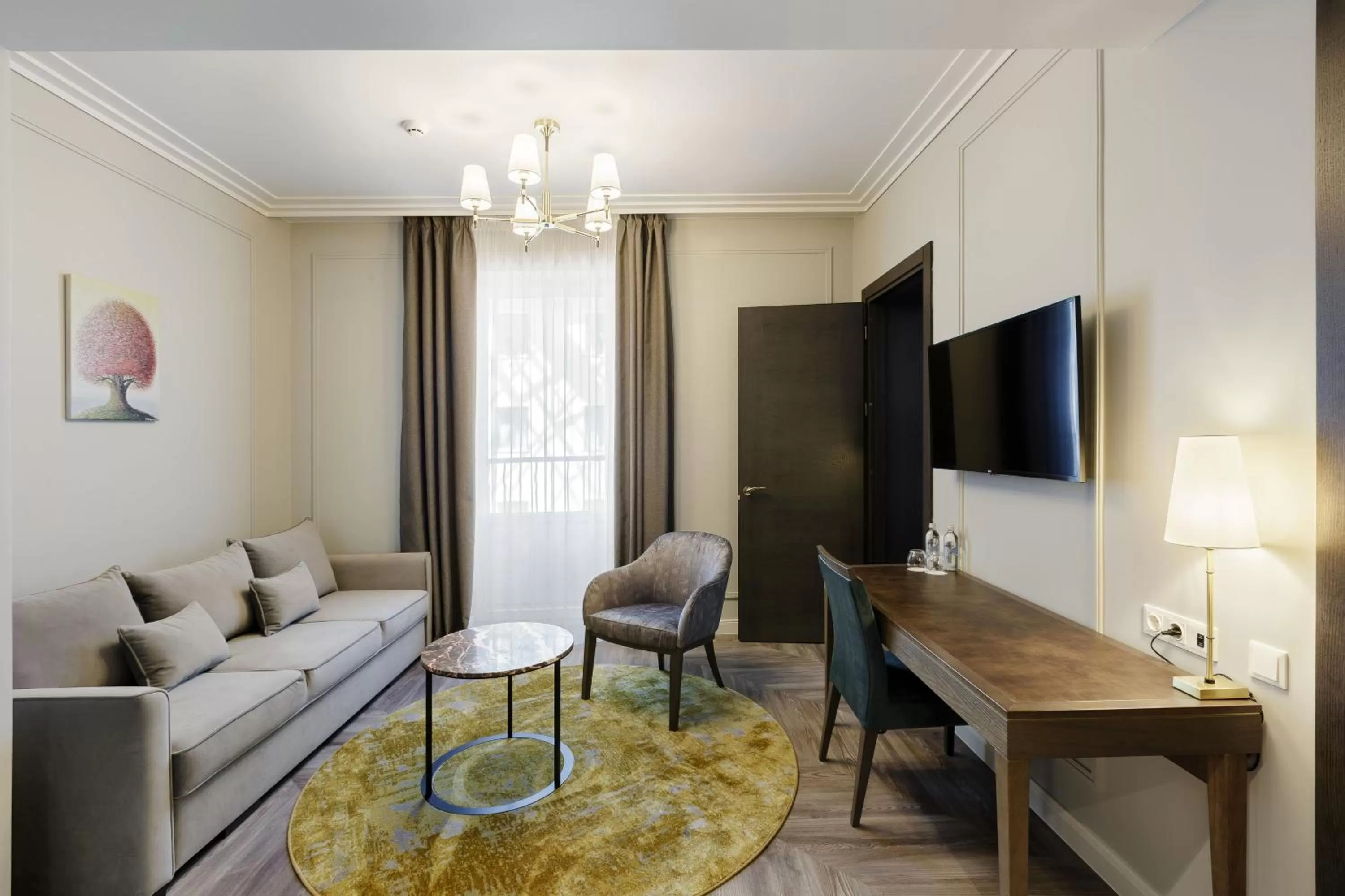 Communal lounge/ TV room in VICTORIA Hotel Klaipėda