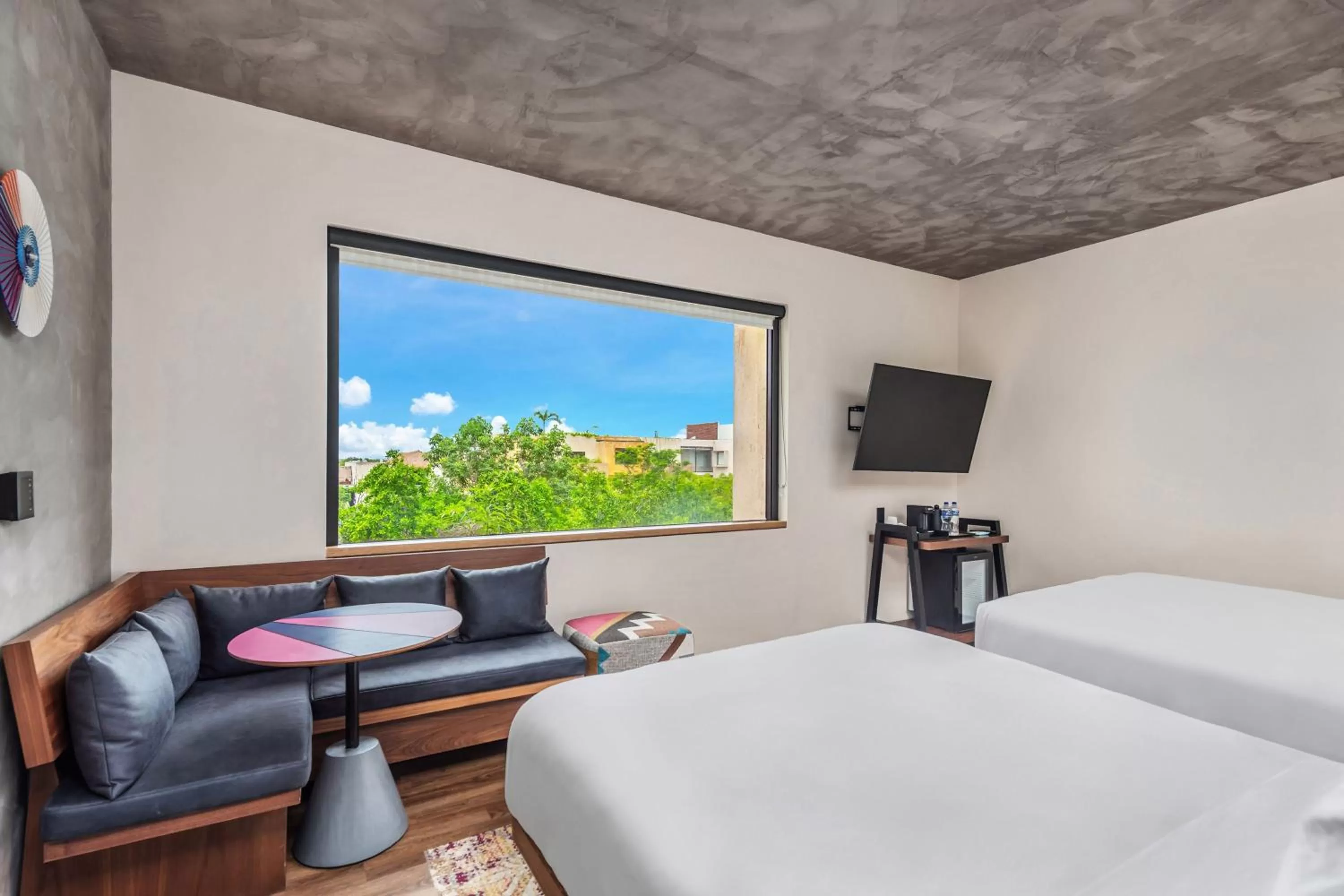 Photo of the whole room, Bed in Aloft Tulum