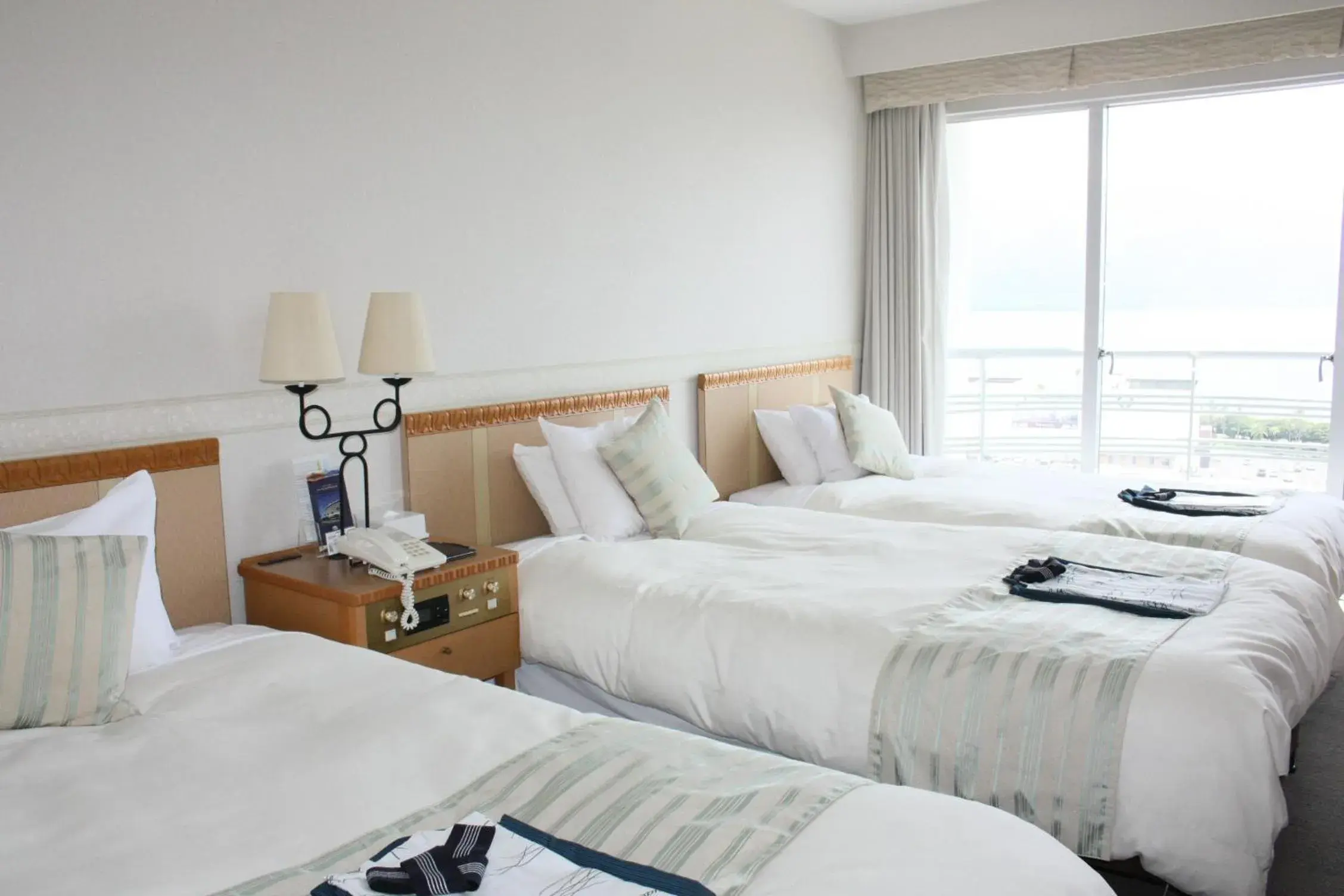 Bed in Kagoshima Sun Royal Hotel