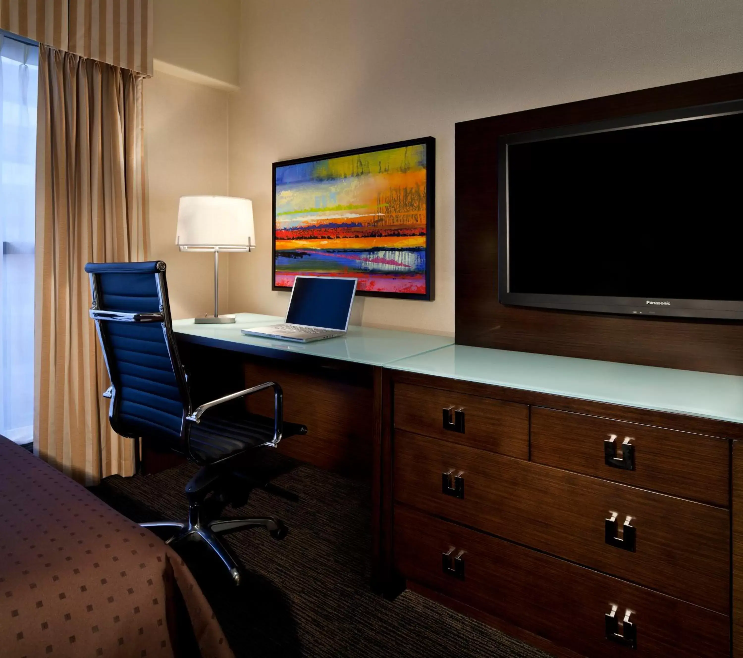 Photo of the whole room, TV/Entertainment Center in Holiday Inn Vancouver Downtown & Suites, an IHG Hotel