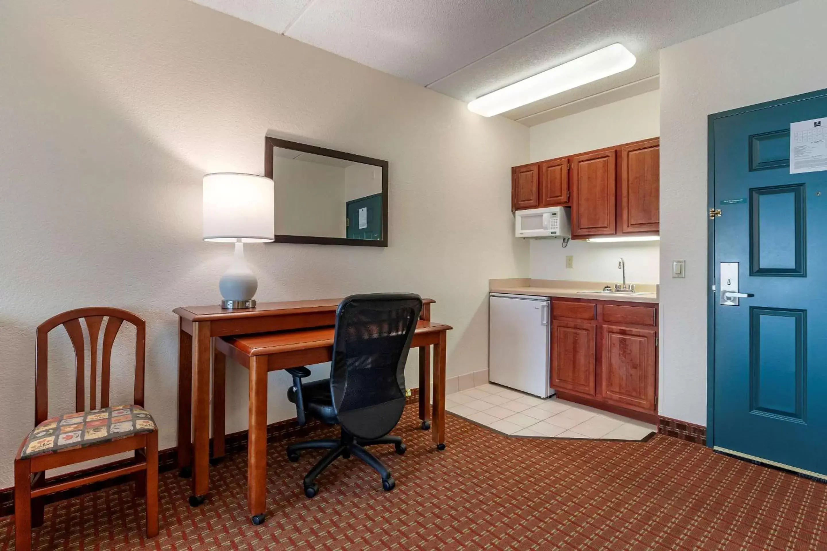 Bedroom in Clarion Suites at The Alliant Energy Center