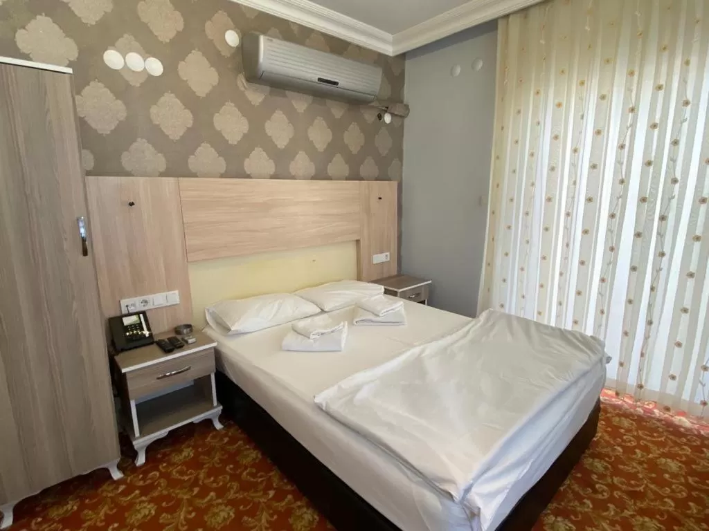 Photo of the whole room, Bed in Sakran Hotel