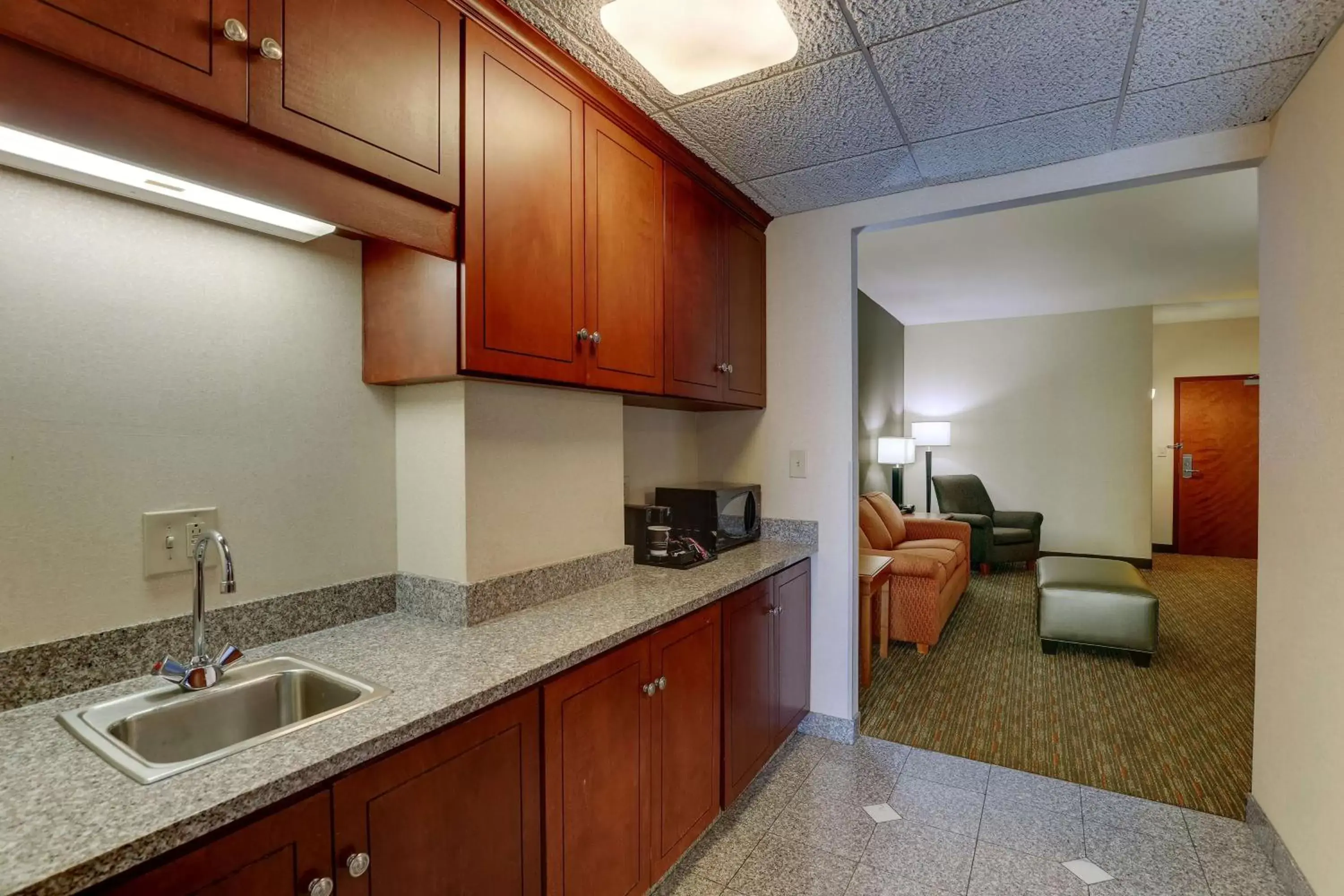 Bedroom, Kitchen/Kitchenette in Drury Inn & Suites Montgomery