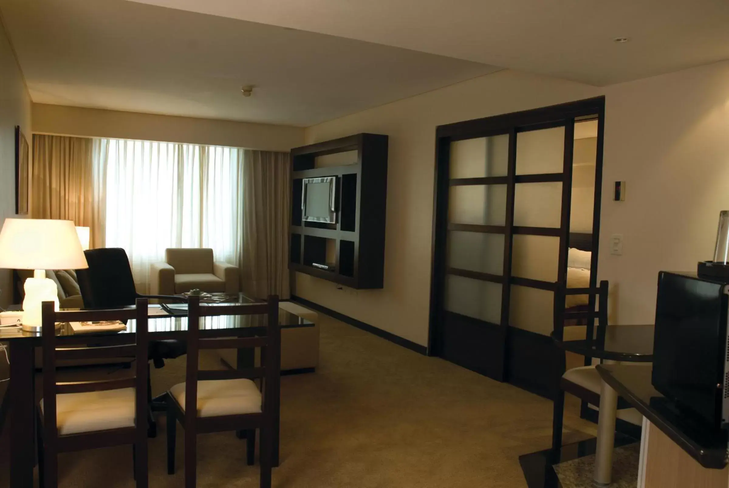 Bed, Dining Area in Eurobuilding Hotel & Suites Caracas