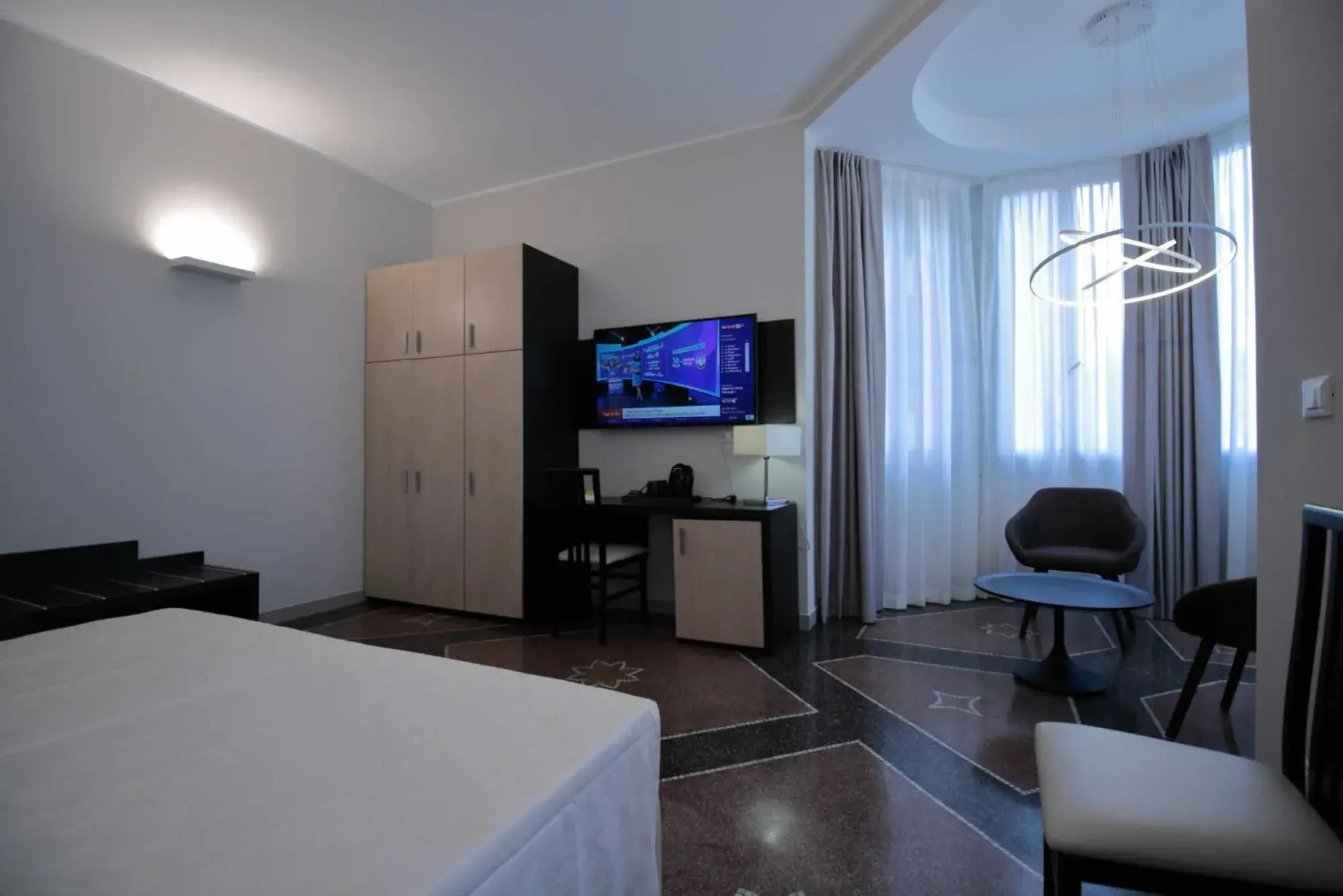 TV/Entertainment Center in Hotel Vittoria