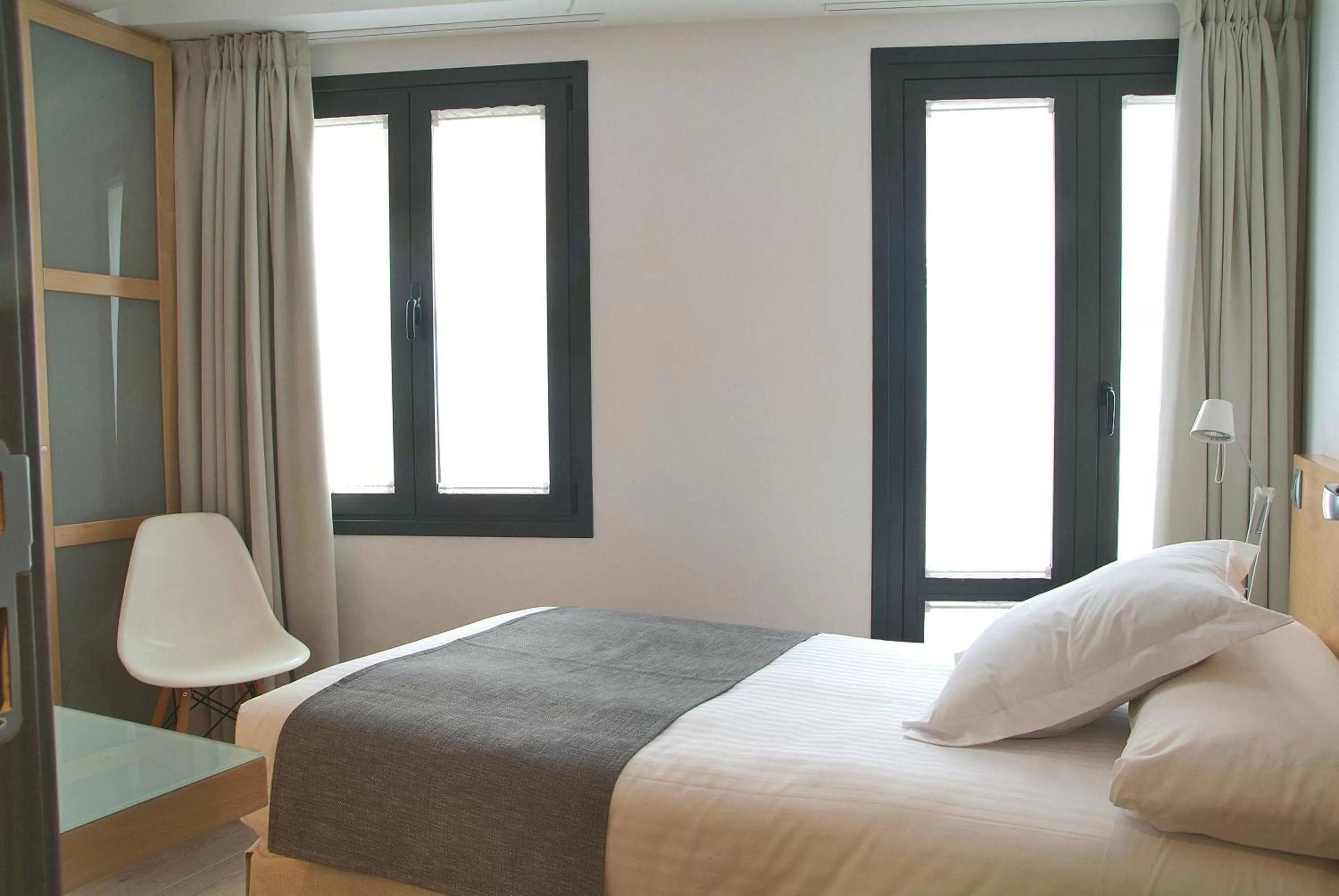 Bed in Le Petit Boutique Hotel