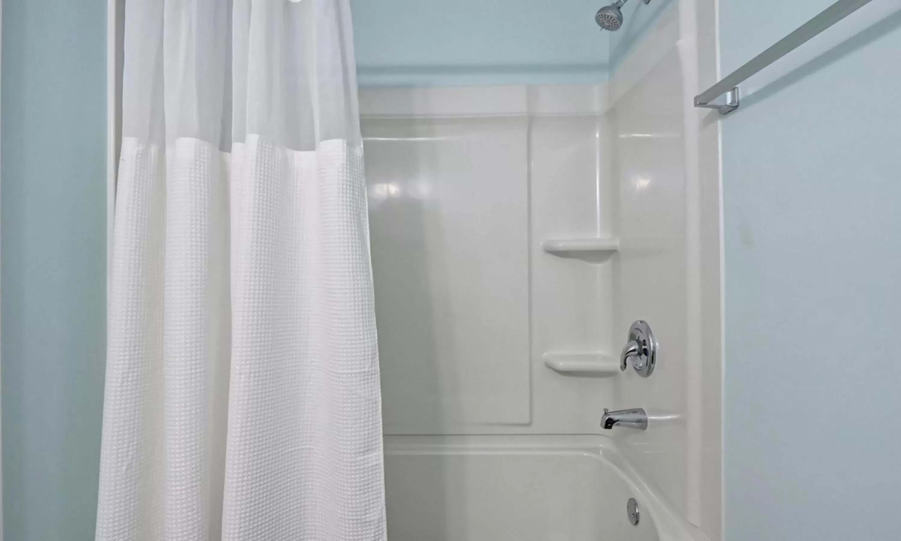 Bathroom in Loggerhead Inn and Suites by Carolina Retreats