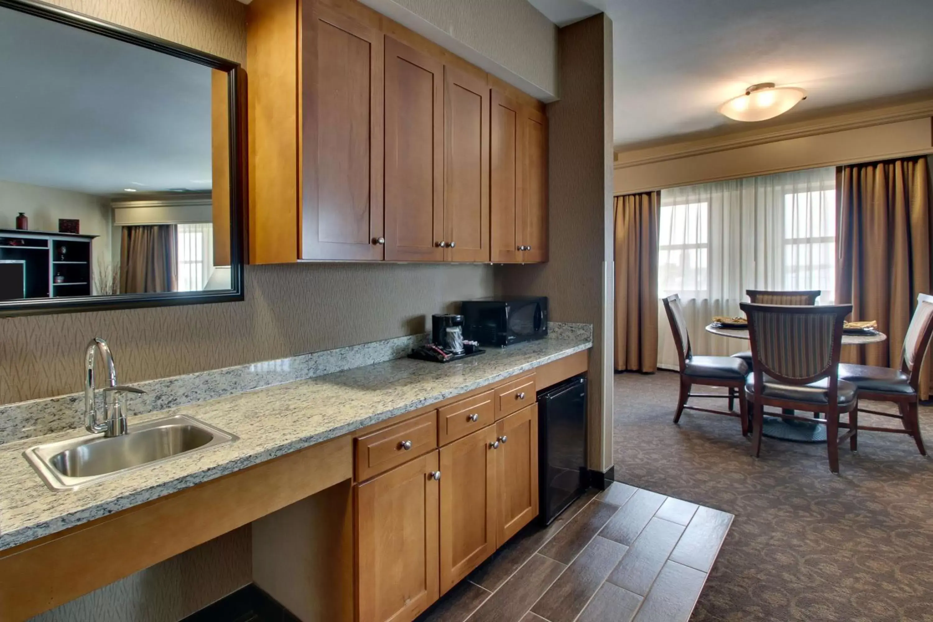 Photo of the whole room, Kitchen/Kitchenette in Drury Plaza Hotel Broadview Wichita