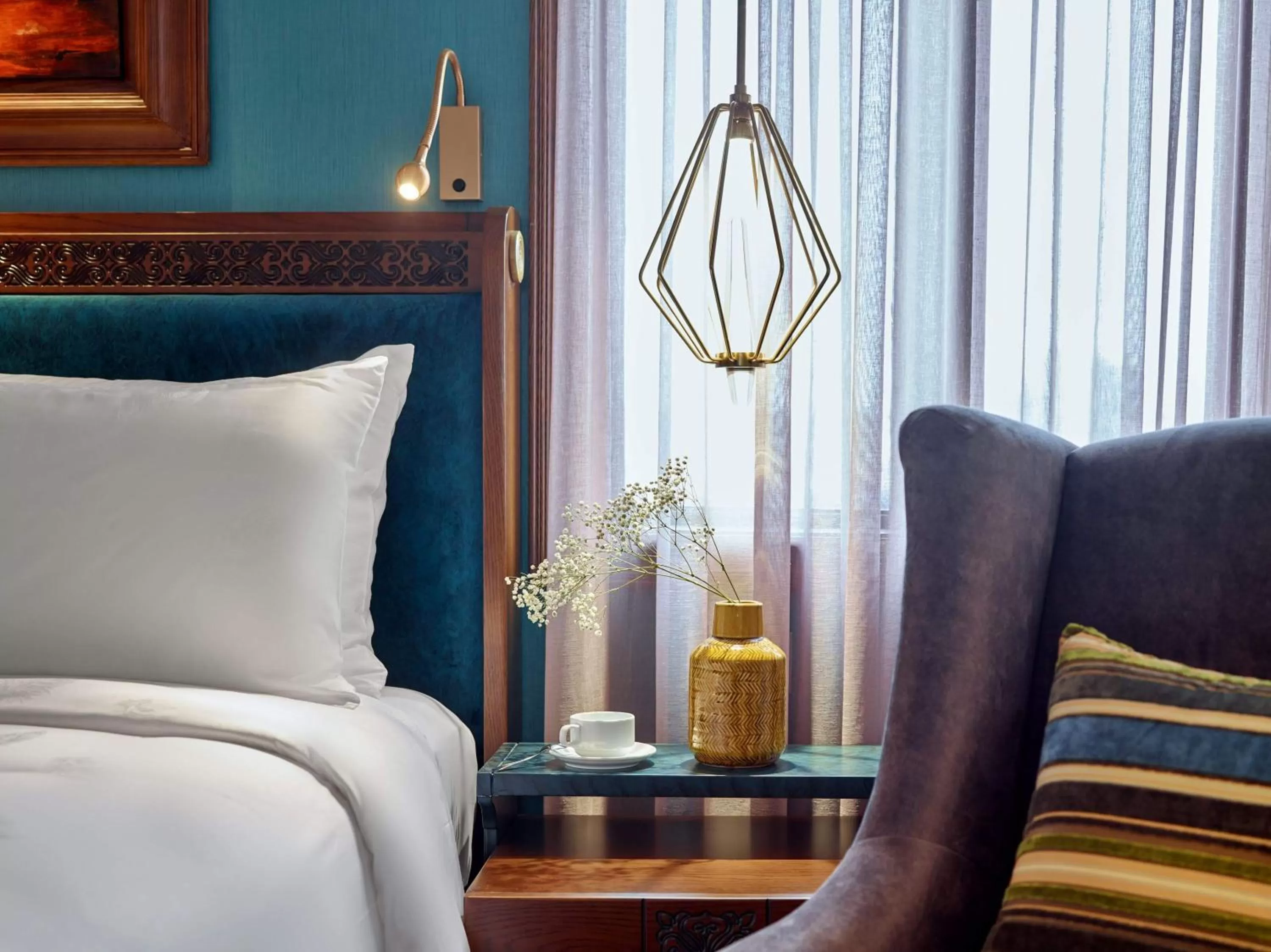 Bed in Peridot Grand Luxury Boutique Hotel