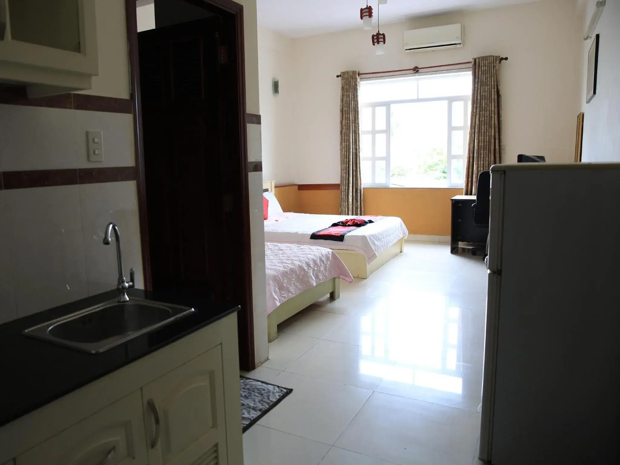 Photo of the whole room, Kitchen/Kitchenette in Hoa Phat Hotel & Apartment