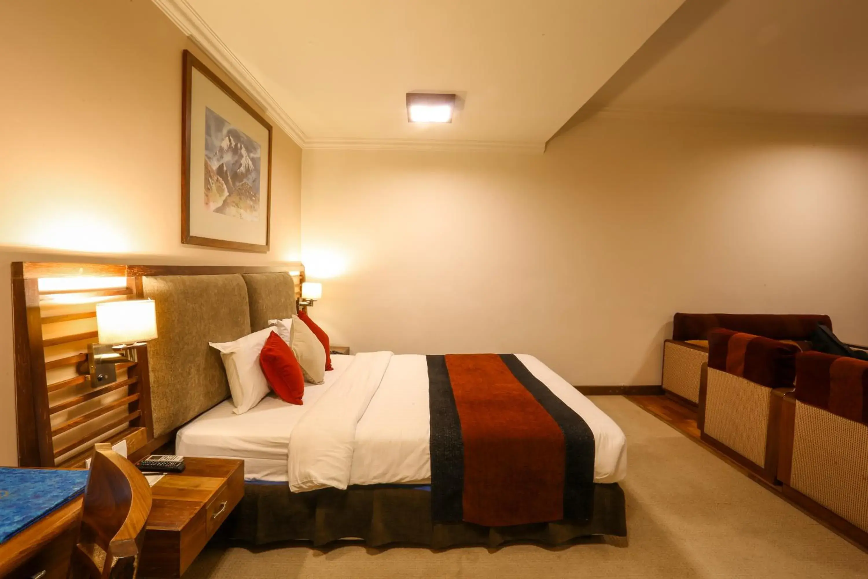 Bed in Atithi Resort & Spa