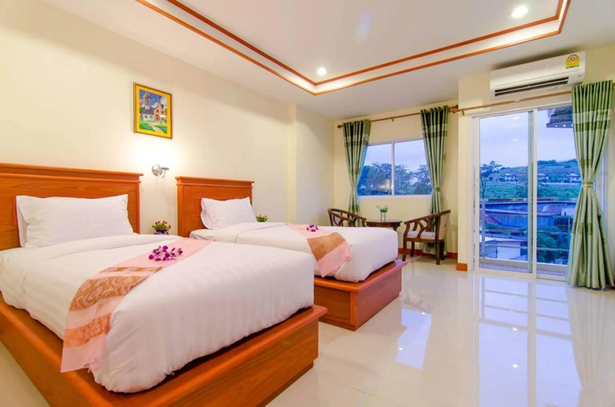 Bed in Phaithong Sotel Resort