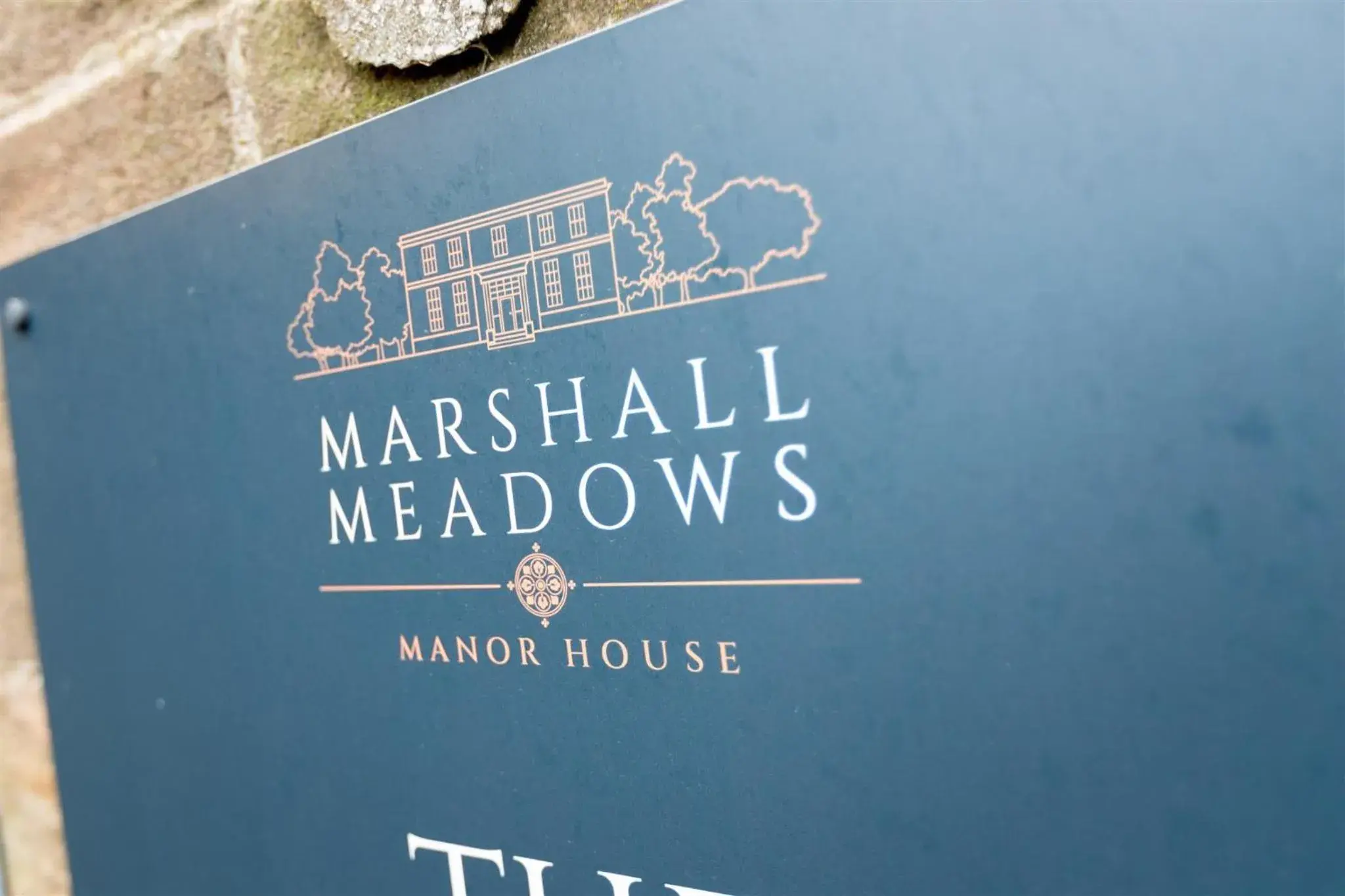 Property logo or sign in Marshall Meadows Manor House