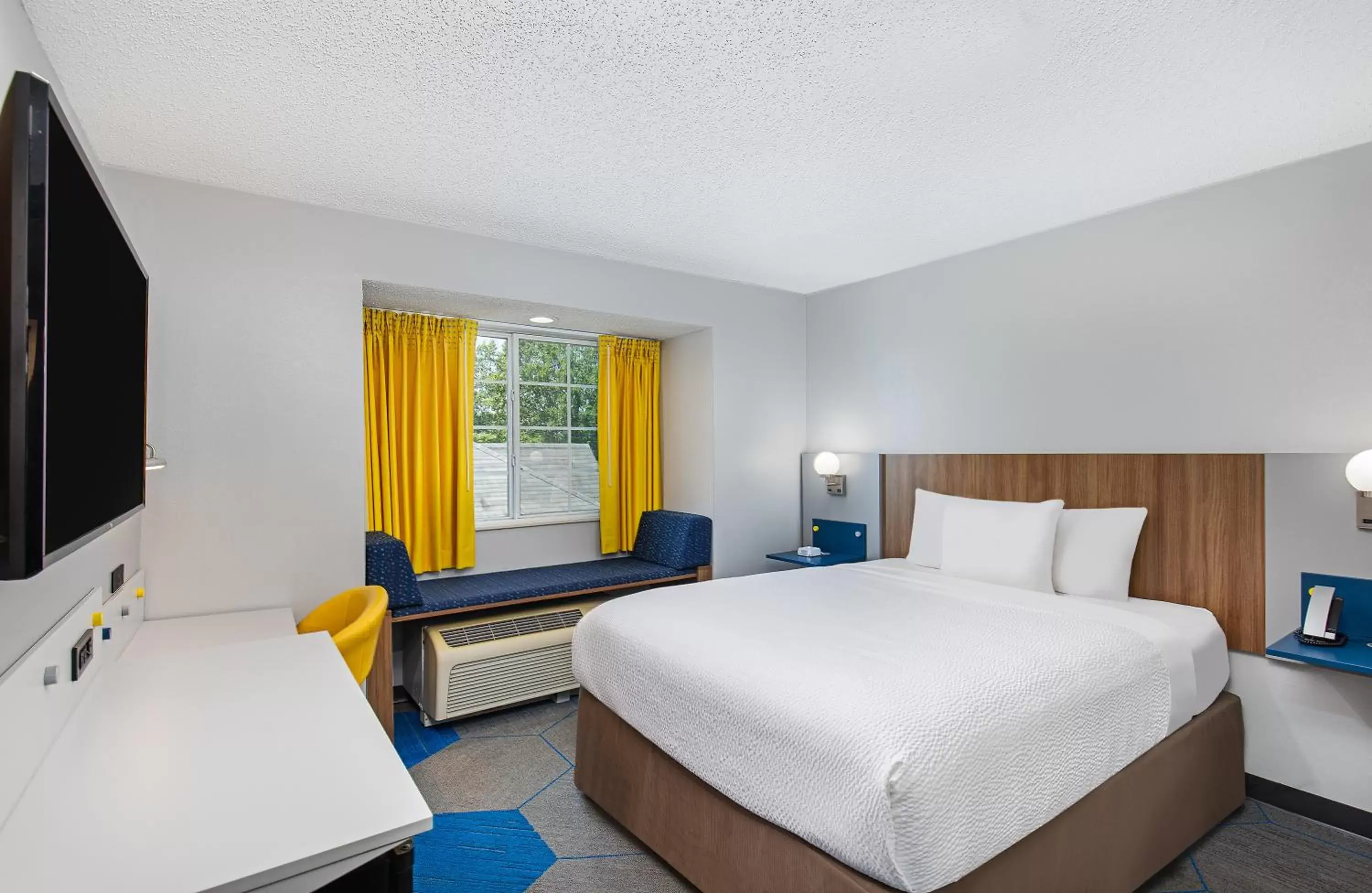 Guests, Bed in Microtel Inn & Suites Columbus North