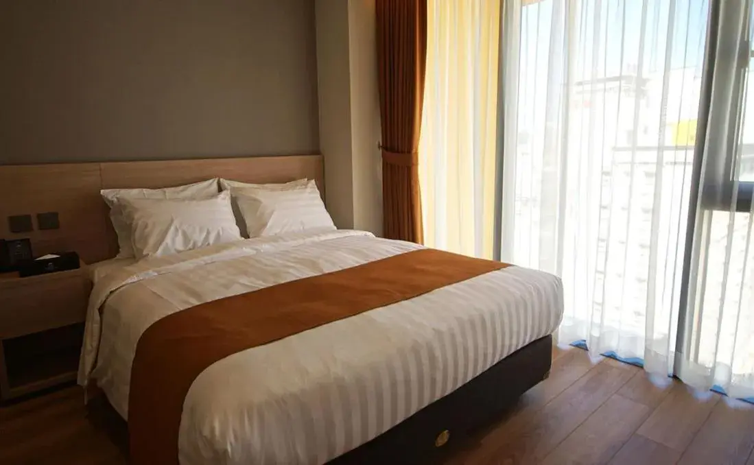 Bed in Gangneung City Hotel