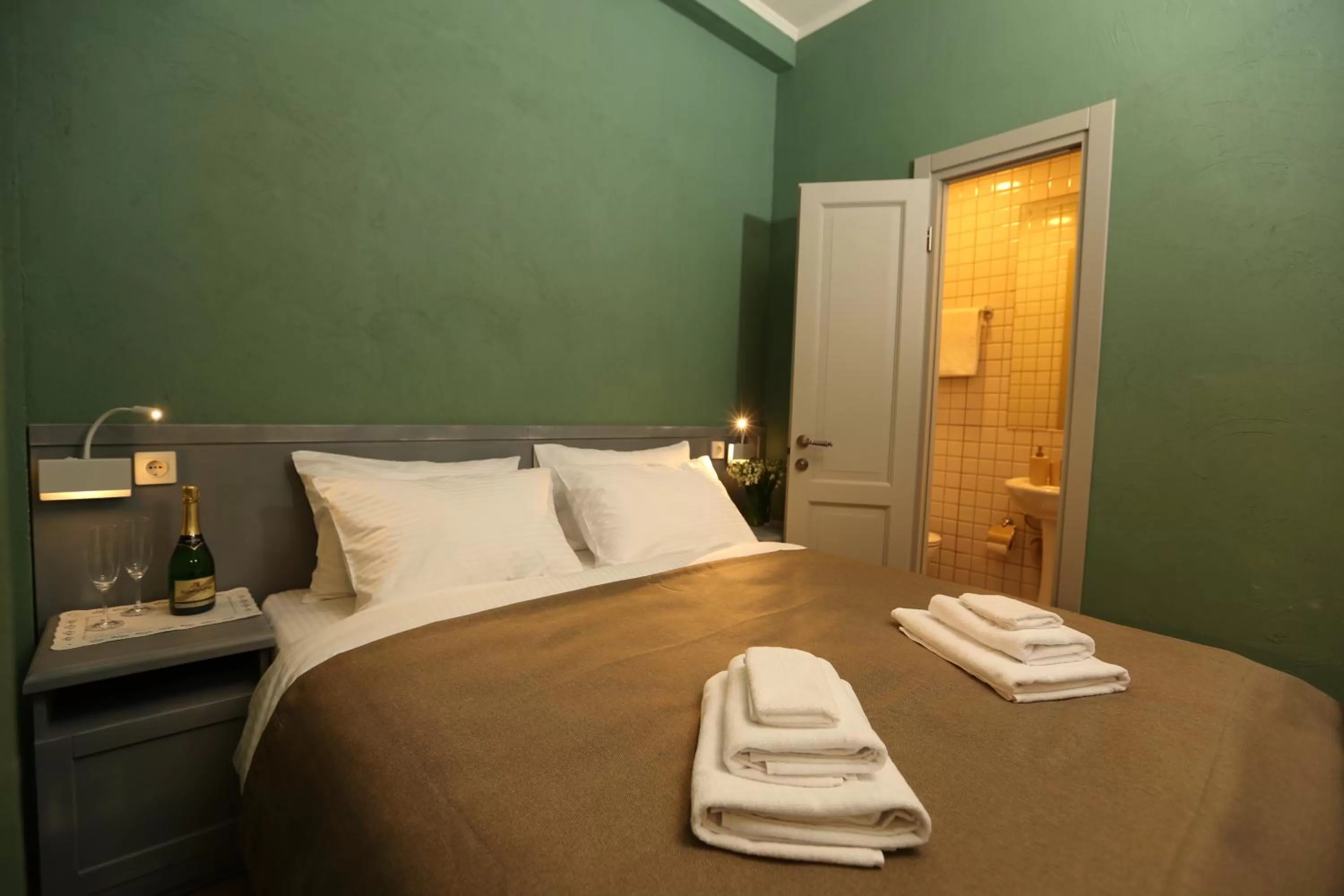 Bed in Kindli Boutique Hotel