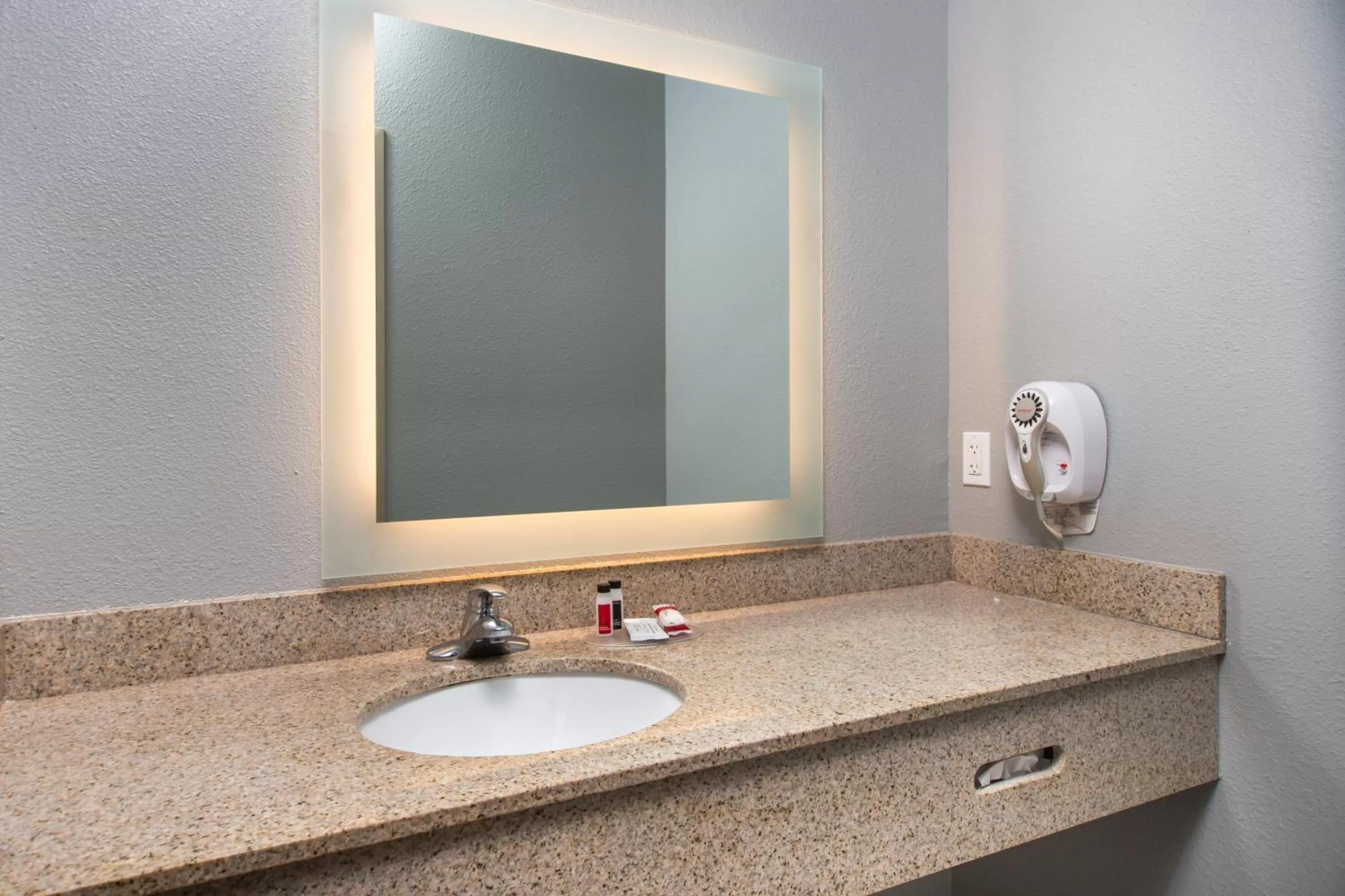 Bathroom in AmericInn by Wyndham Rapid City