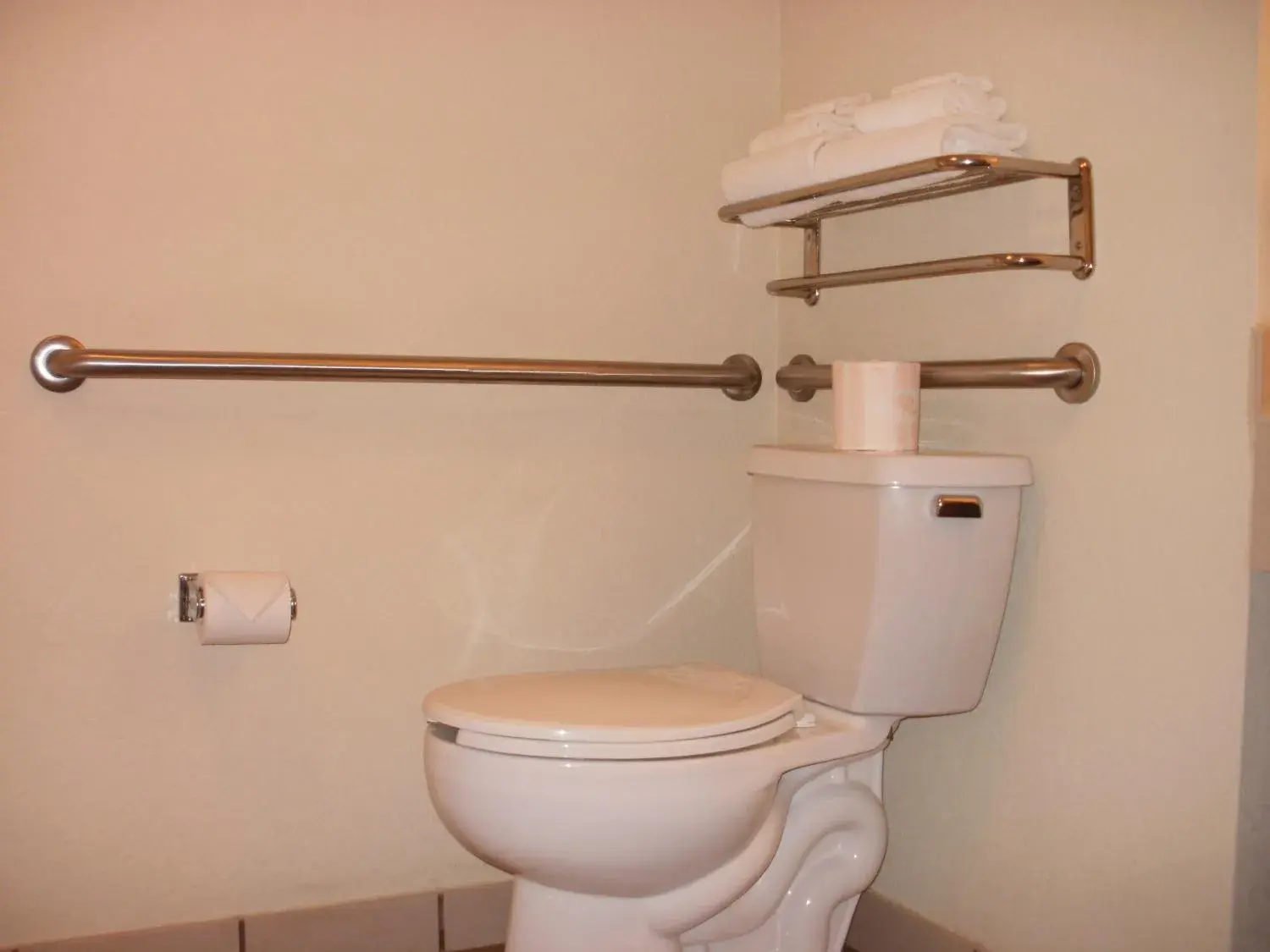 Toilet, Bathroom in Mackinaw Beach And Bay All Suites Resort