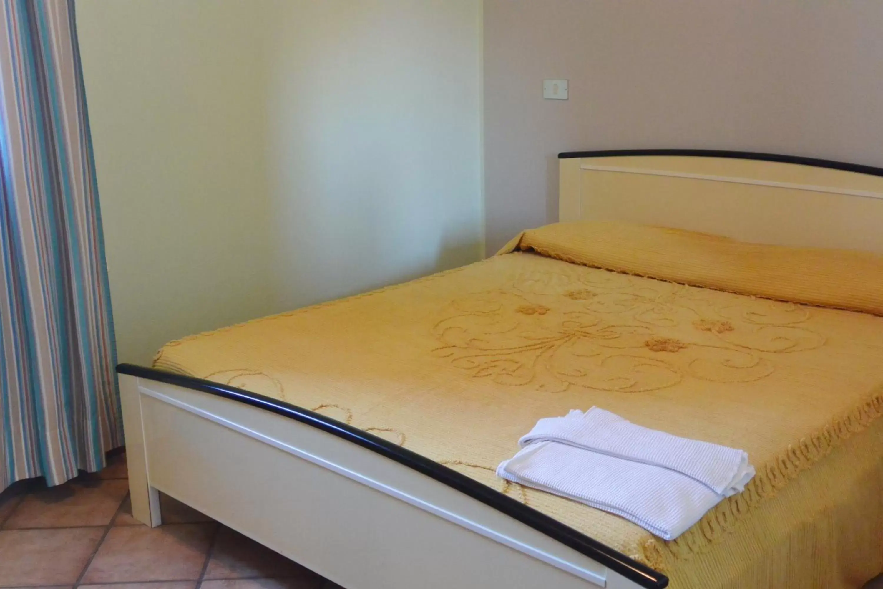 Bed in Albergo Escondido