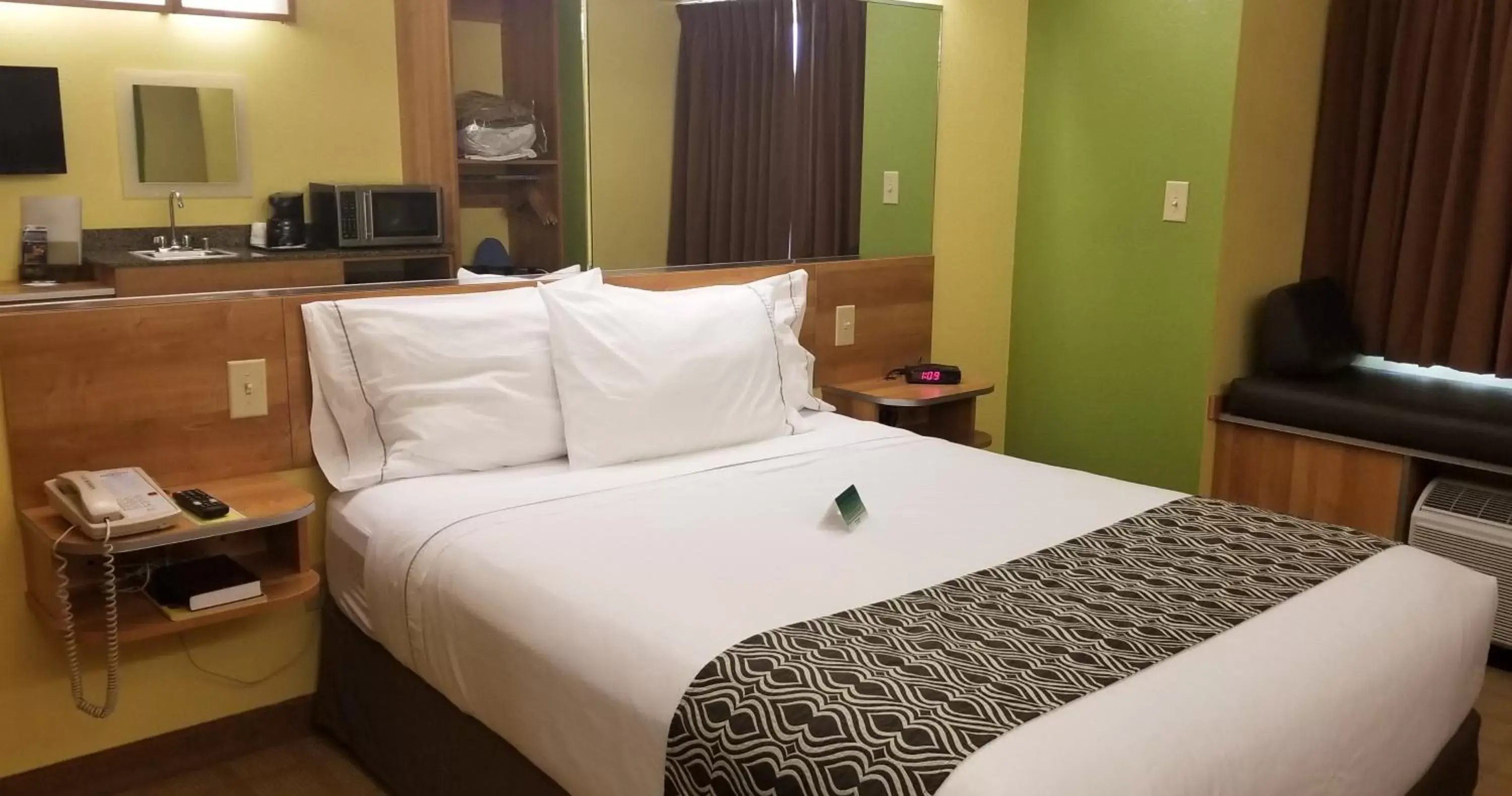 Bed in Microtel Inn & Suites by Wyndham Delphos