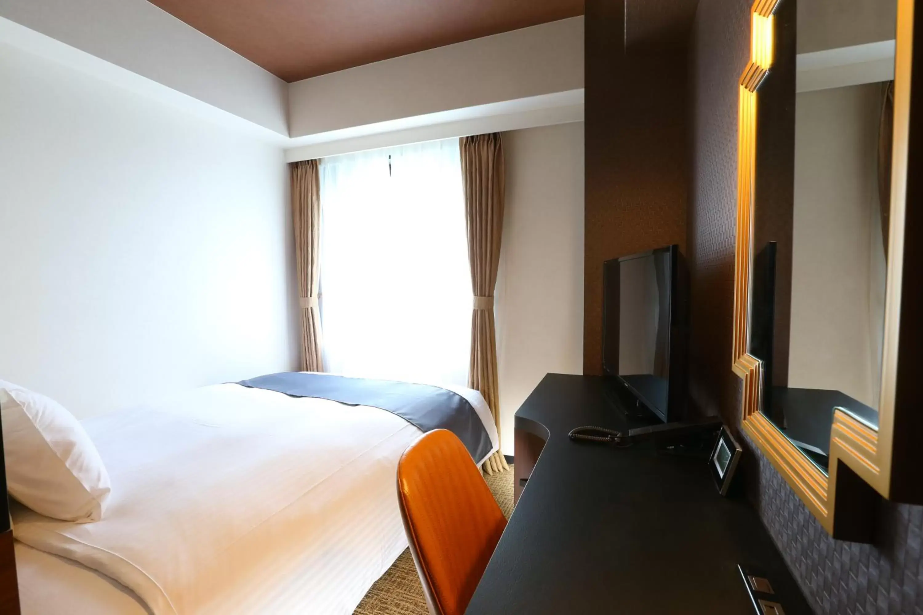 Bed in Hotel Wing International Select Osaka Umeda