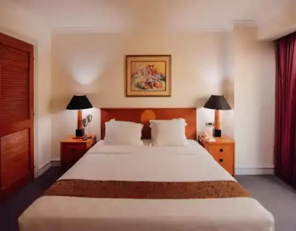 Bed in Surabaya Suites Hotel Powered by Archipelago