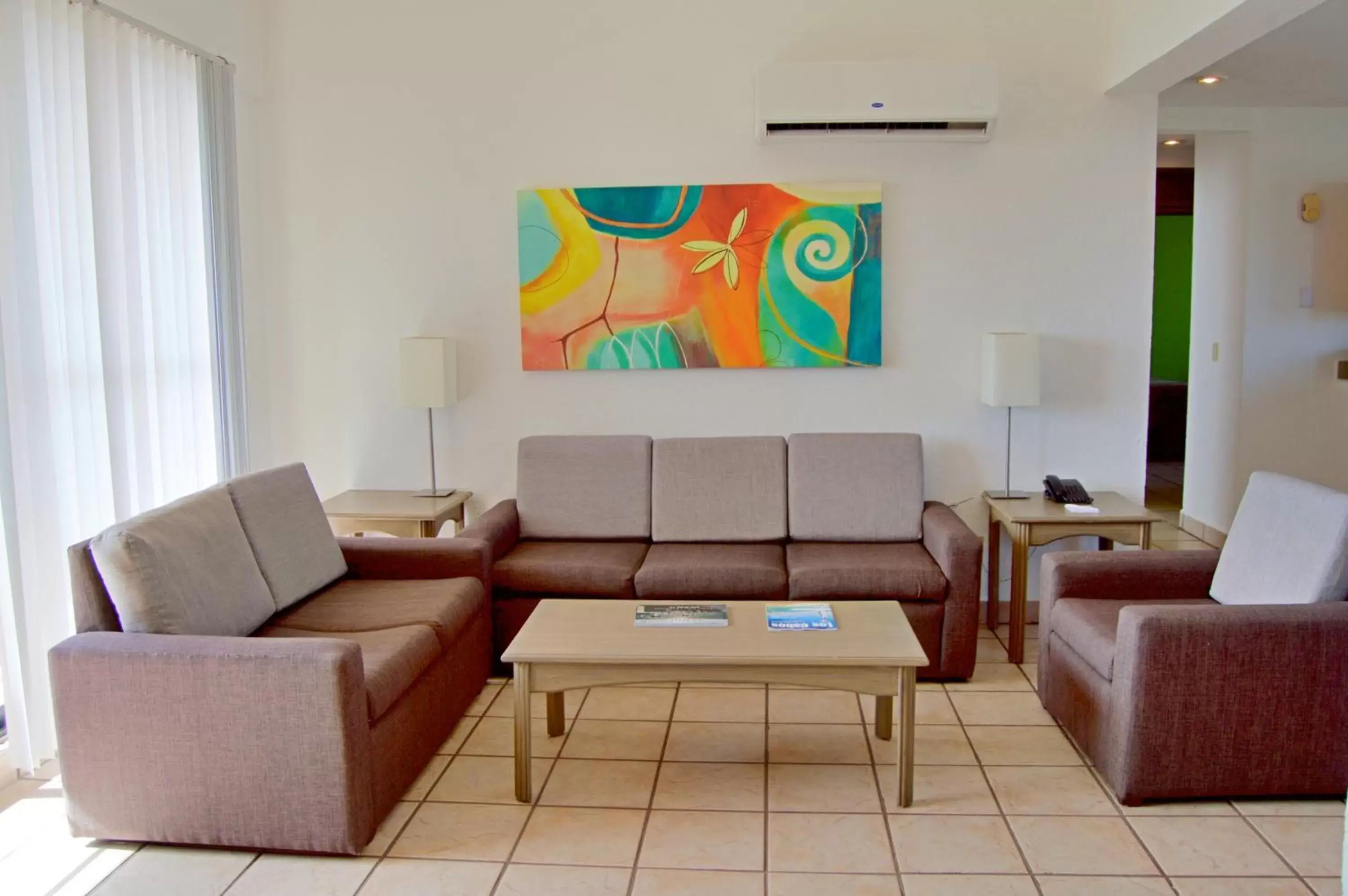 Living room, Seating Area in Sunrock Hotel & Suites