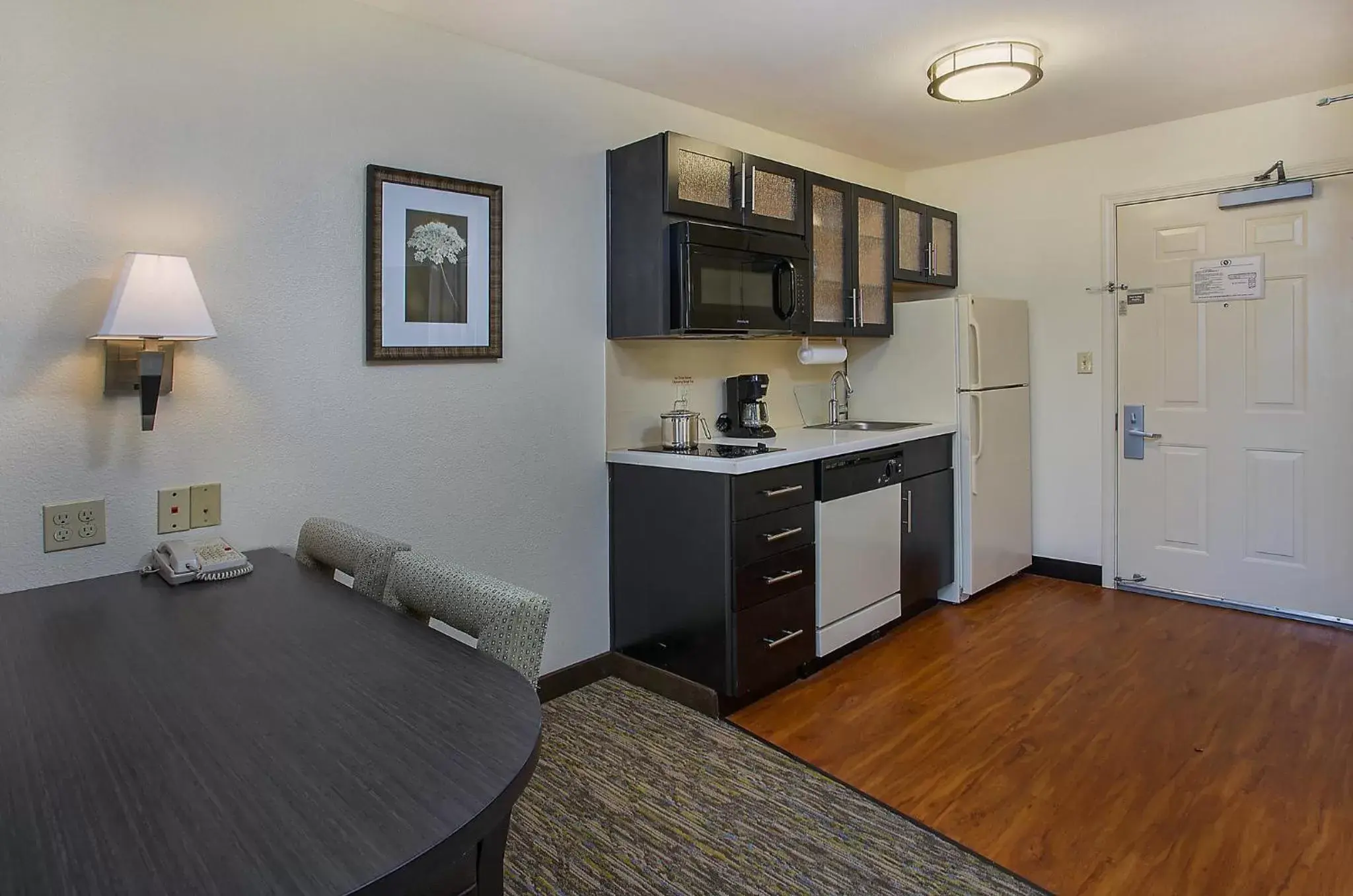 Photo of the whole room, Kitchen/Kitchenette in Candlewood Suites Louisville Airport, an IHG Hotel