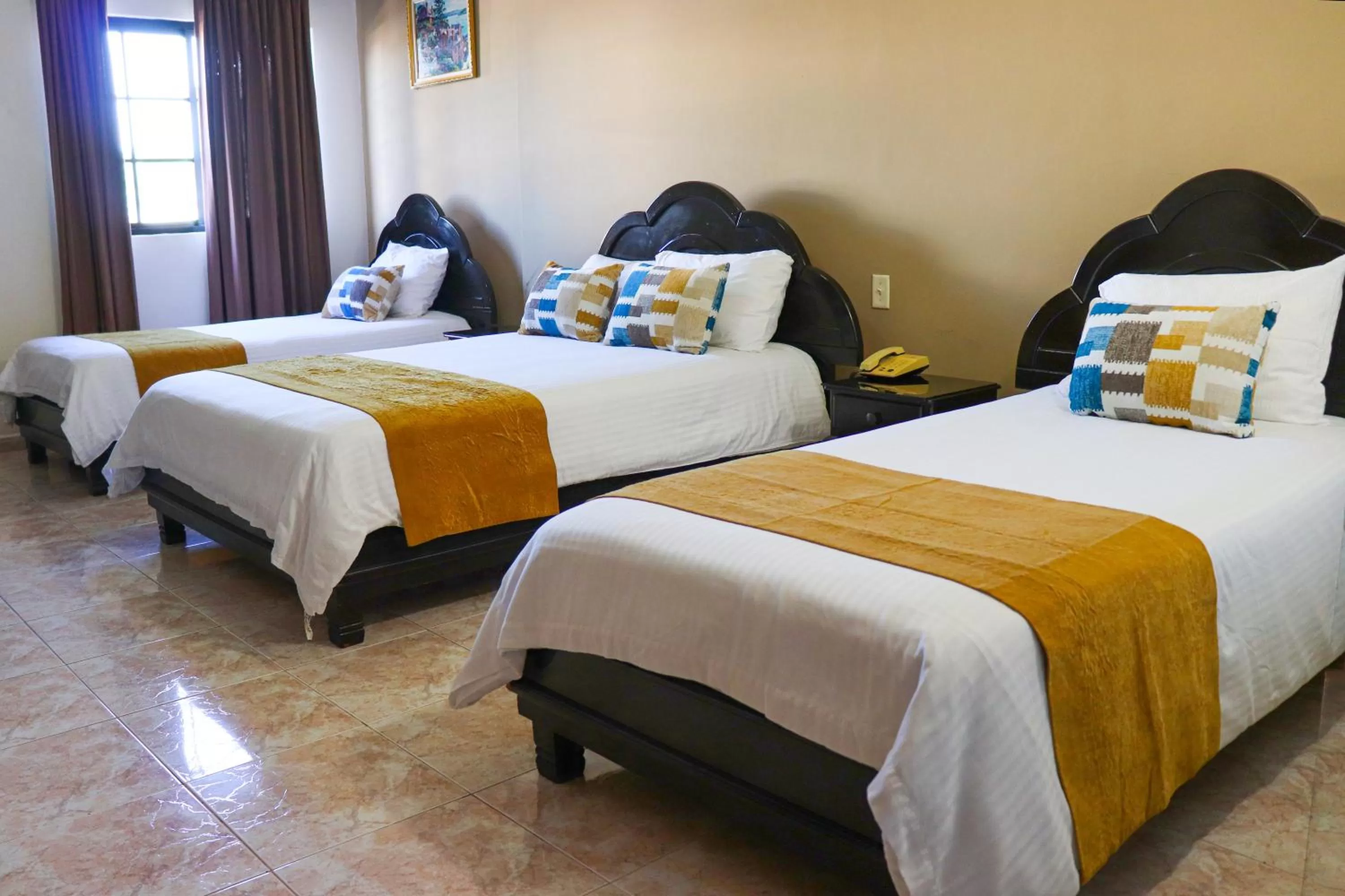 Bed in Hotel Puerta del Sol