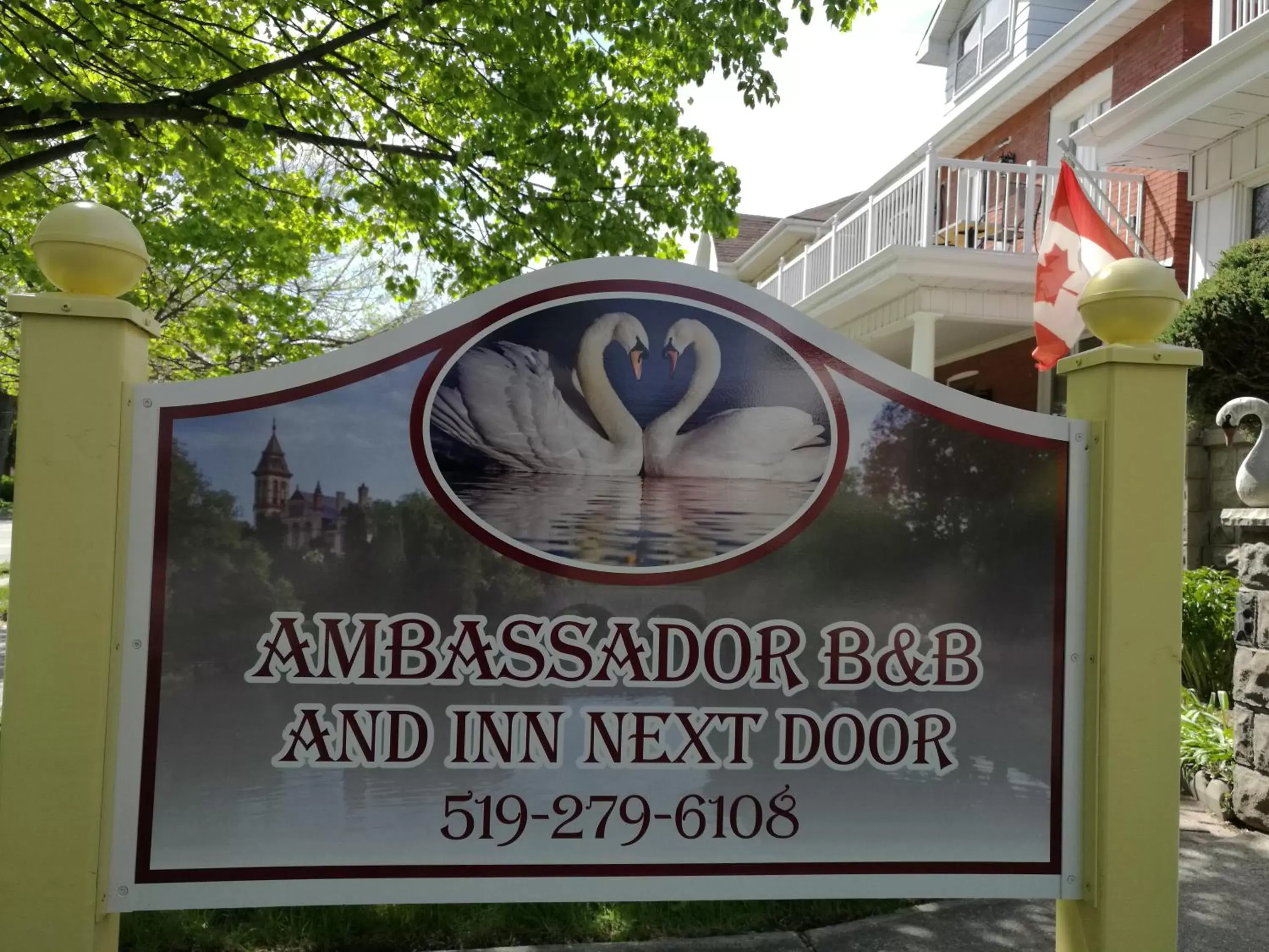 Property building, Property Logo/Sign in Ambassador's Inn Next Door