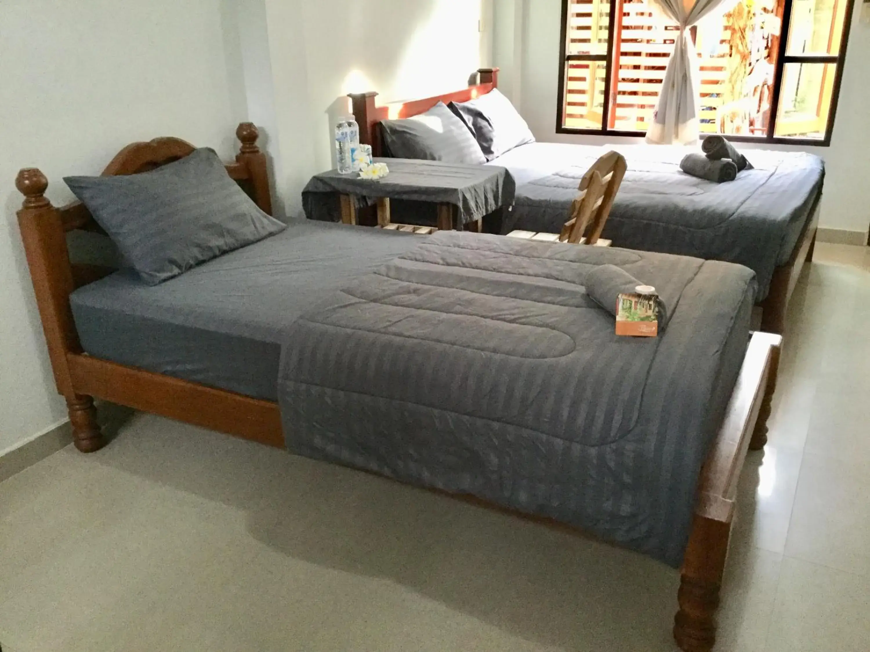 Photo of the whole room, Bed in Thai Guesthouse Photo of the whole room, Bed in Thai Guesthouse