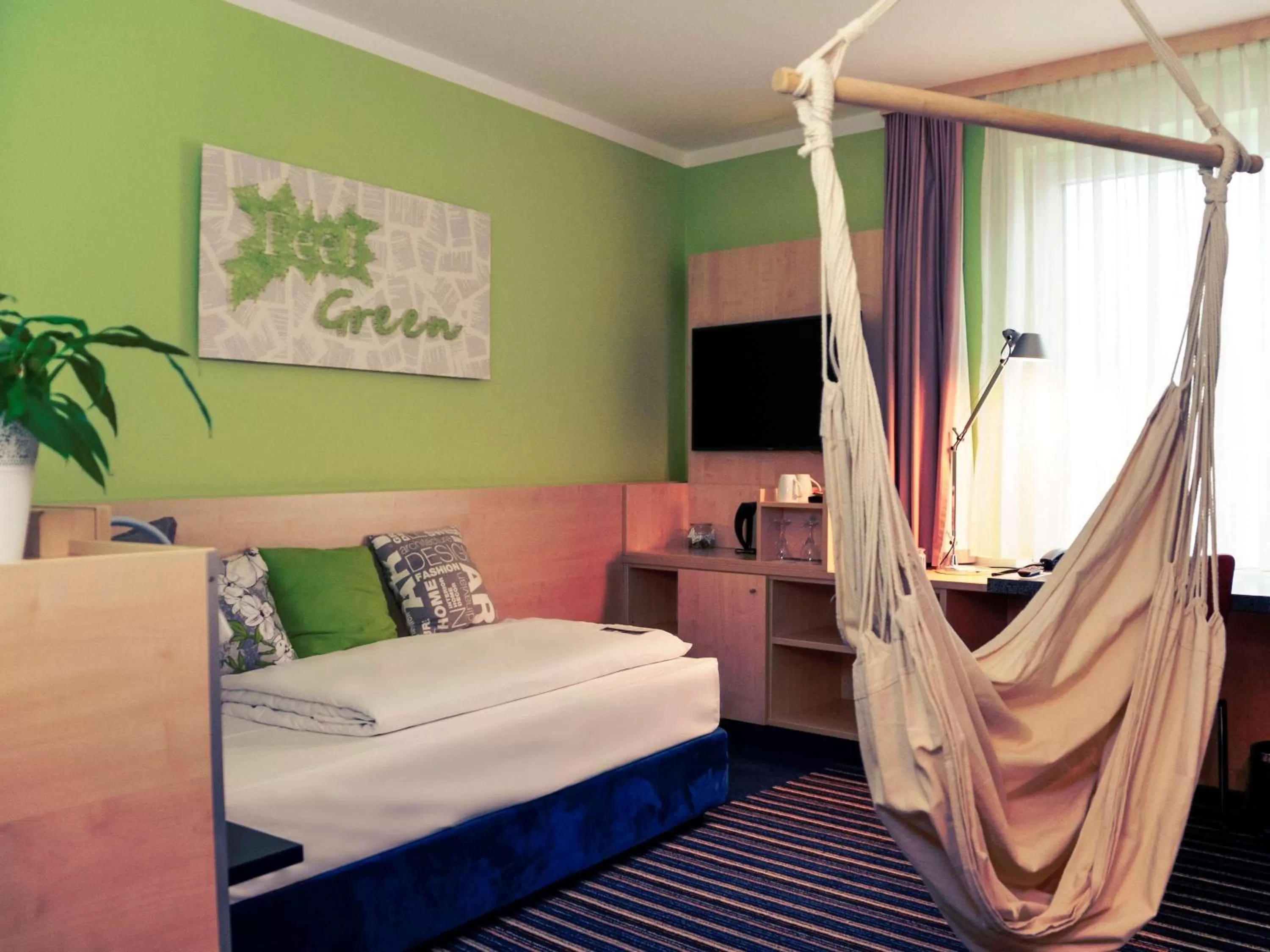 Photo of the whole room, Bed in Mercure Stuttgart City Center