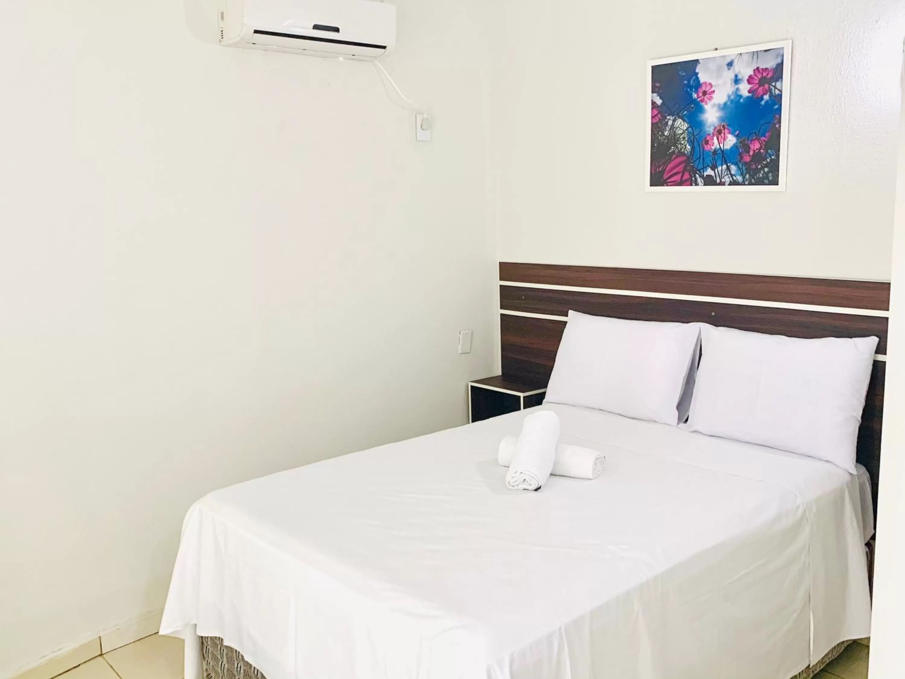 Bed in SAMIR HOTEL COMFORT