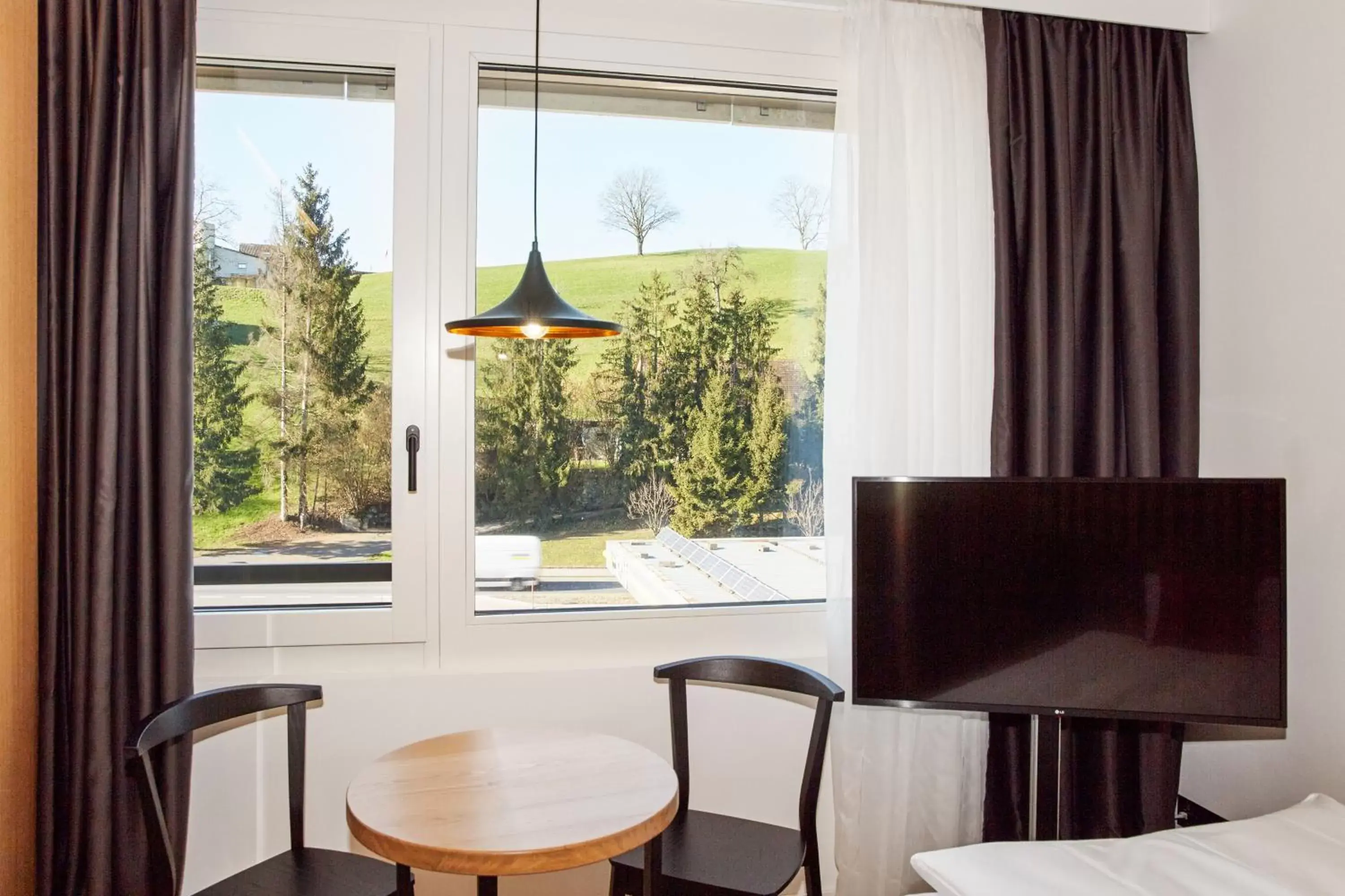 View (from property/room), TV/Entertainment Center in Tailormade Hotel RIGIBLICK Küssnacht